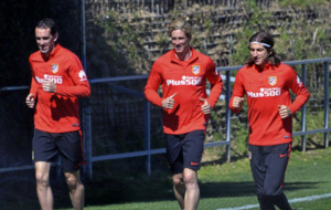 Entrenamiento de God�n, Torres y Filipe Luis en el d�a libre de los...