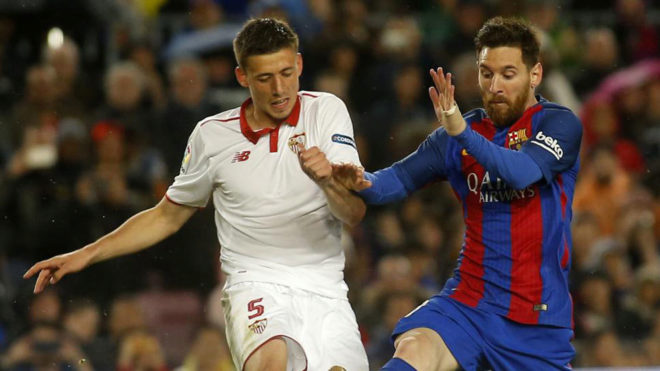 Lenglet y Messi.