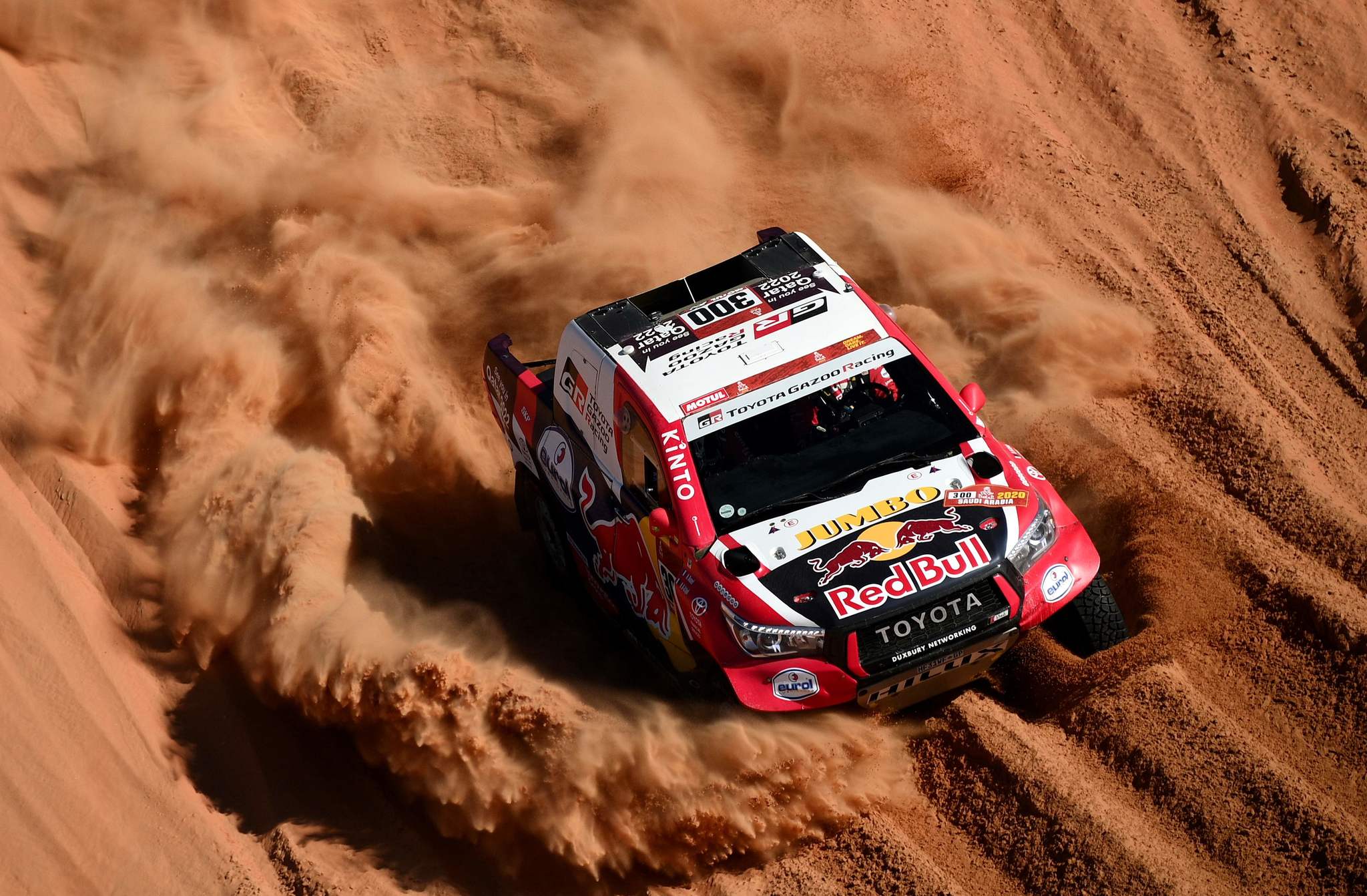 TOPSHOT - Toyotas driver Nasser Al-<HIT>Attiyah</HIT> of Qatar and his co-driver Mathieu Baumel of France compete during the Stage 11 of the Dakar 2020 between Shubaytah and Haradh, Saudi Arabia, on January 16, 2020. (Photo by FRANCK FIFE / AFP)