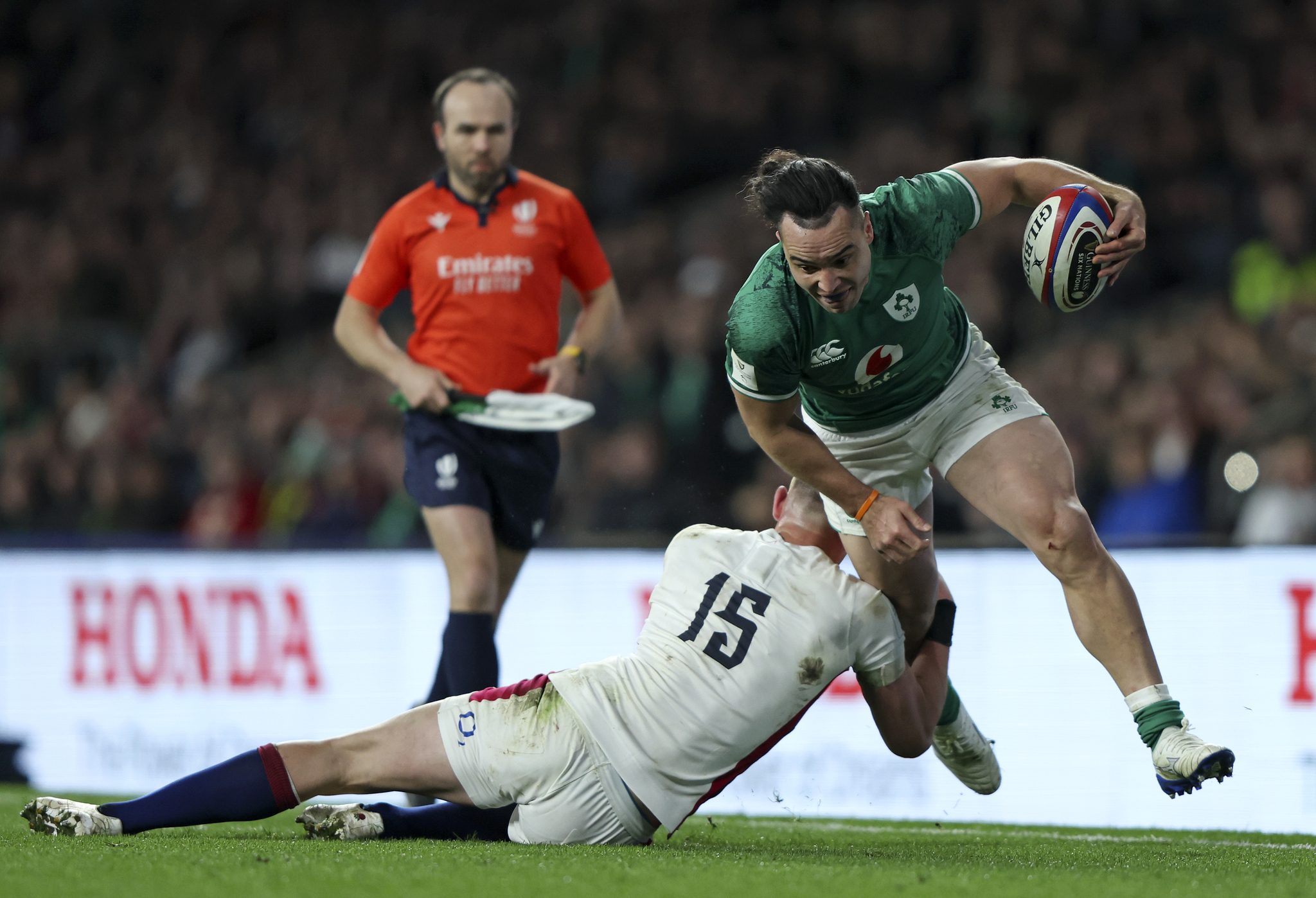 Irelands James Lowe is tackled by Englands Freddie Steward