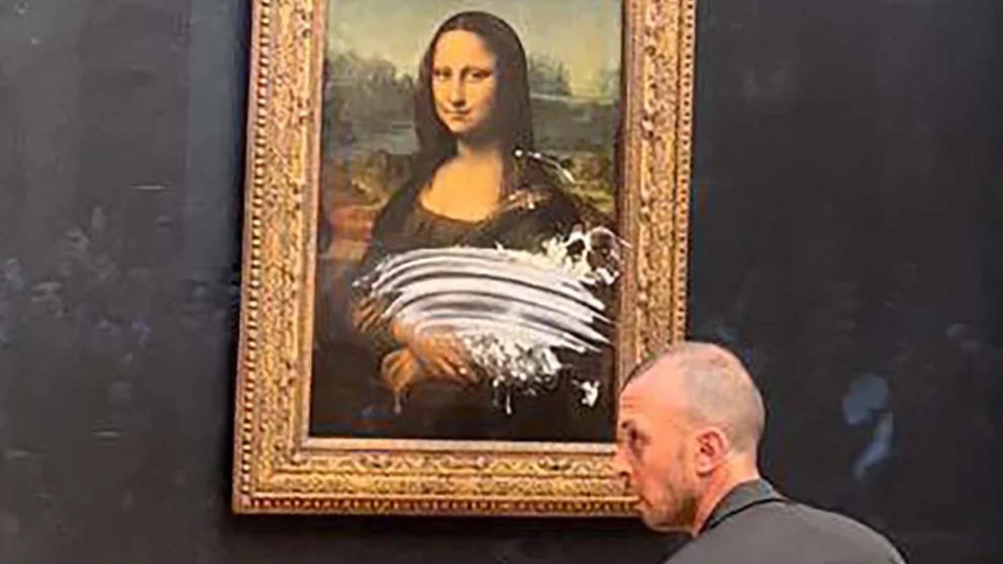 man dressed as old lady throws cake at mona lisa gets caked by disguised woman the Louvre priority-05-midsummer-lace-round-neck-gown-champagne