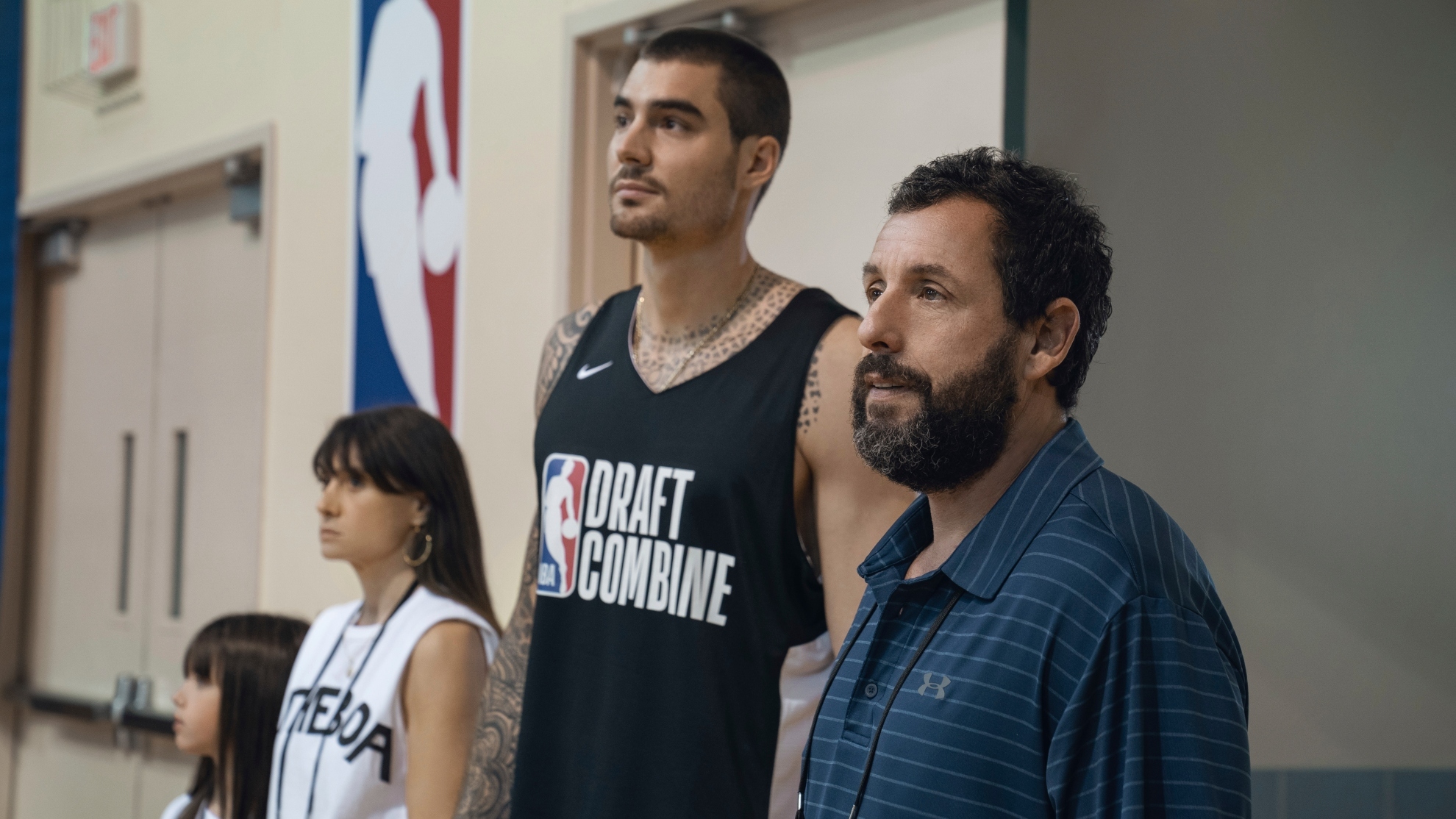 Ainhoa Pillet, Maria Botto, Juancho Hernangomez and Adam Sandler in a scene from Hustle.