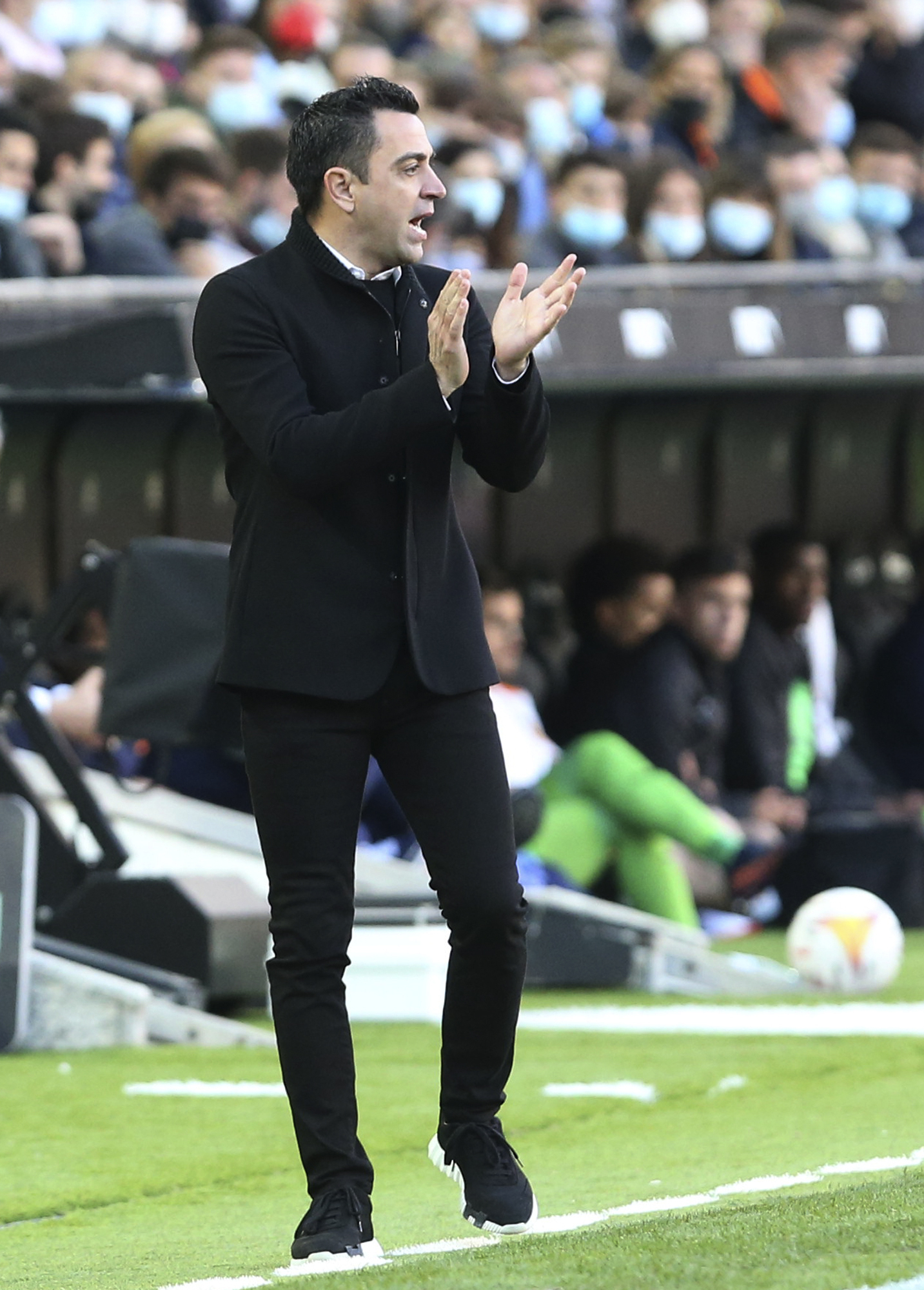 Xavi, durante un partido en la banda.