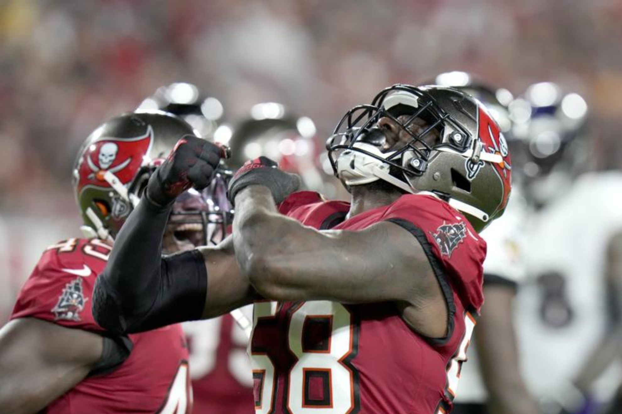 Shaquil Barrett celebrates after sacking Ravens QB Lamar Jackson. Would fall to injury shortly after.