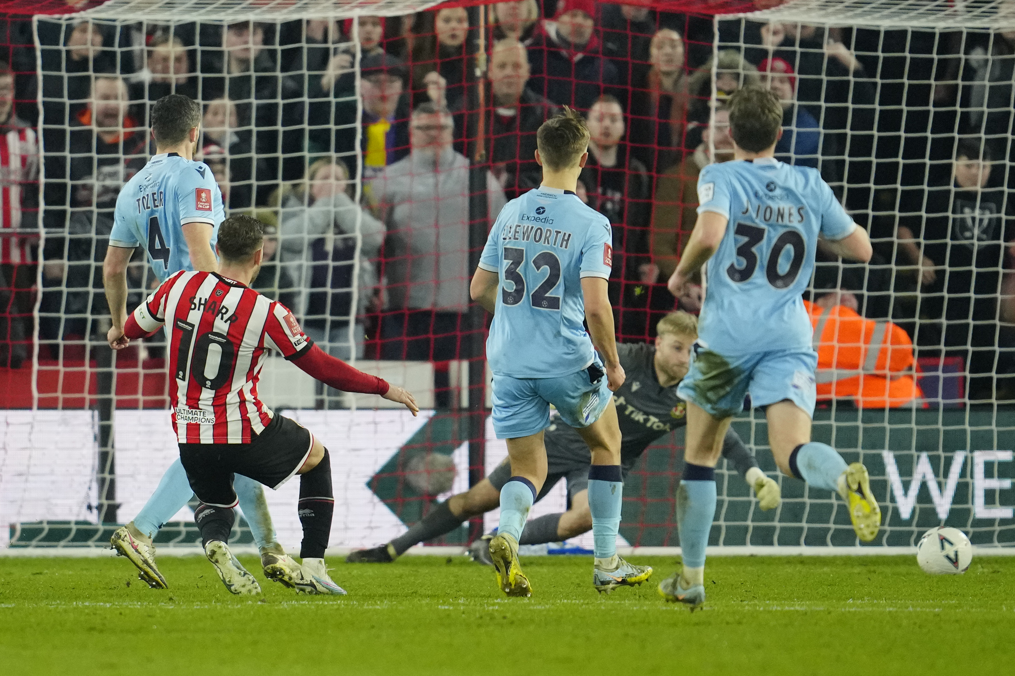 Sheffields Billy Sharp, second left, scores his sides second goal during FA Cup 4th round match