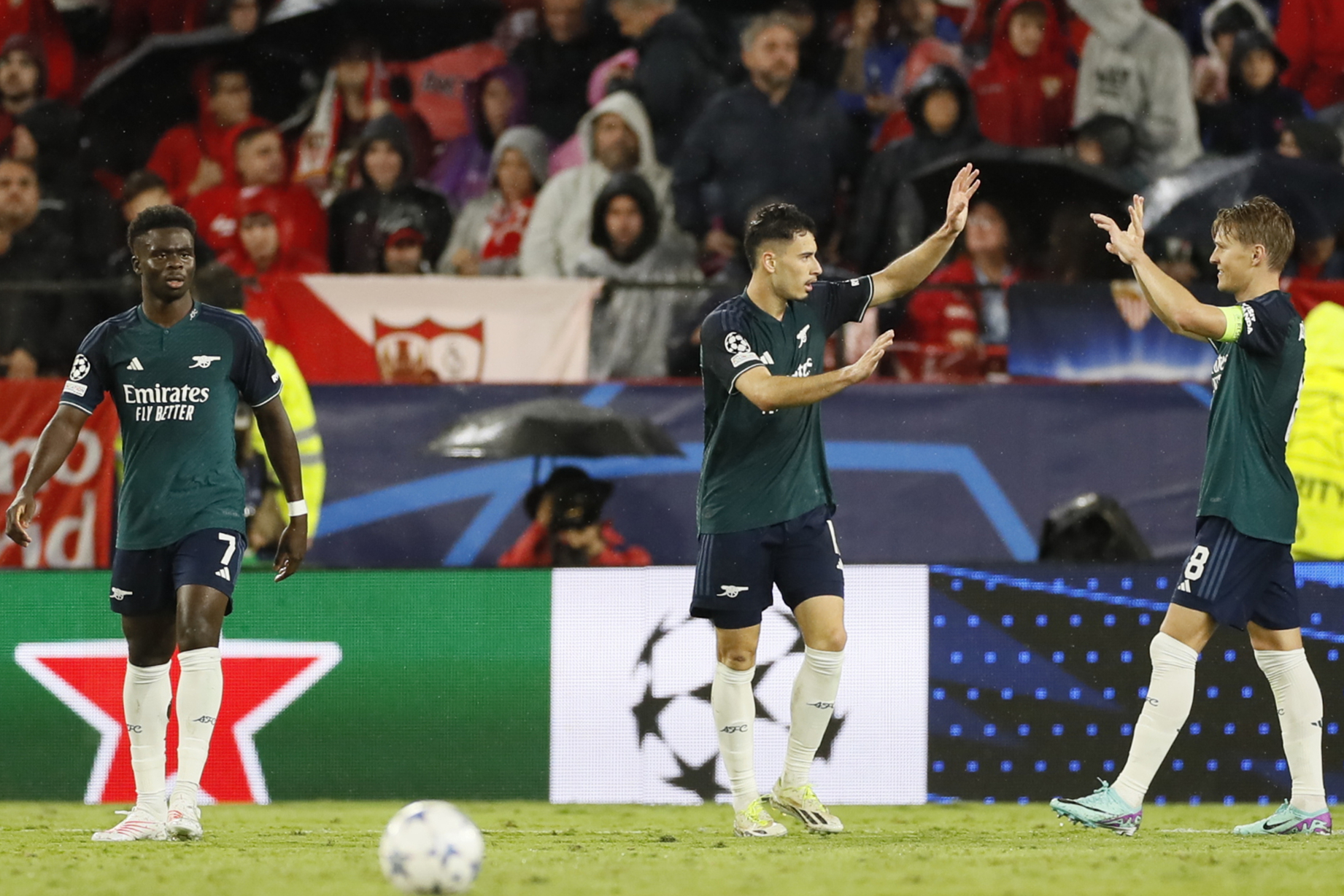 Arsenal players celebrate.