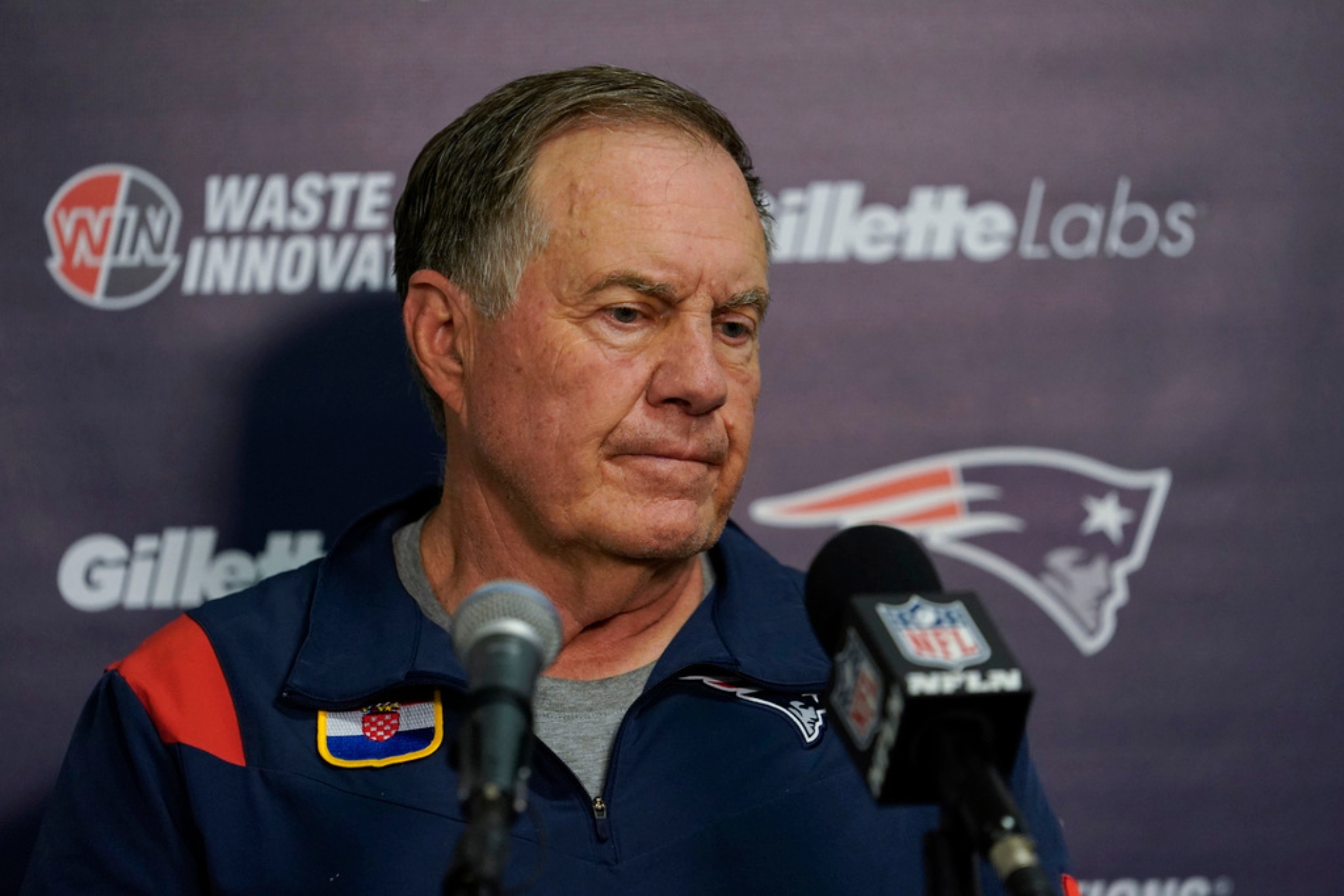New England Patriots head coach Bill Belichick speaks during a news conference following an NFL football game against the Miami Dolphins