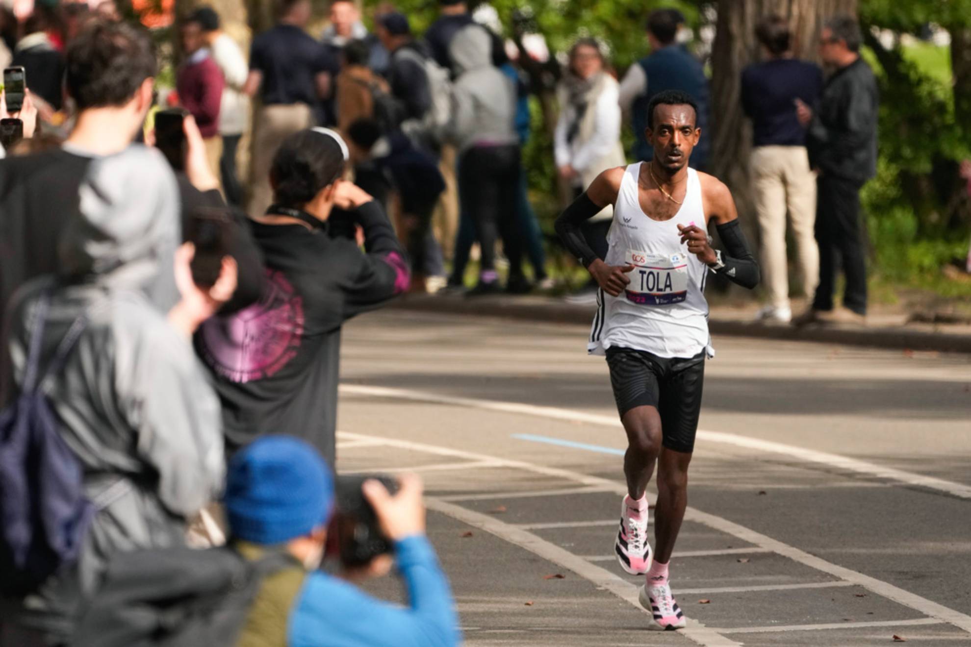 Tamirat Tola, of Ethiopia, runs though Central Park during the New York City Marathon in New York /