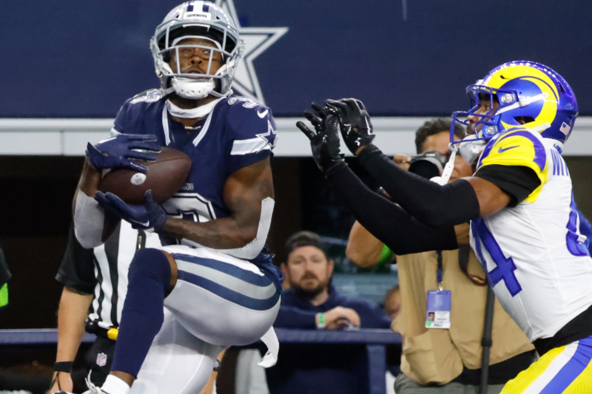 Cowboys wider receiver Brandin Cooks (left).