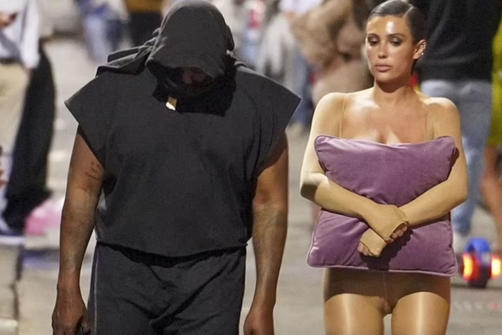 why does kanye west wife dress the way she does Kanye West Defends Bianca Censori Amid 'Invisible Dress' Controversy