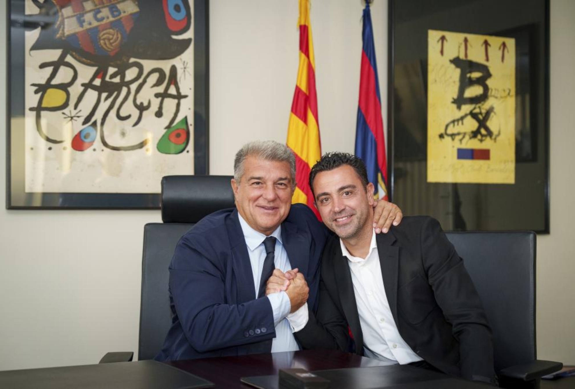 Laporta and Xavi