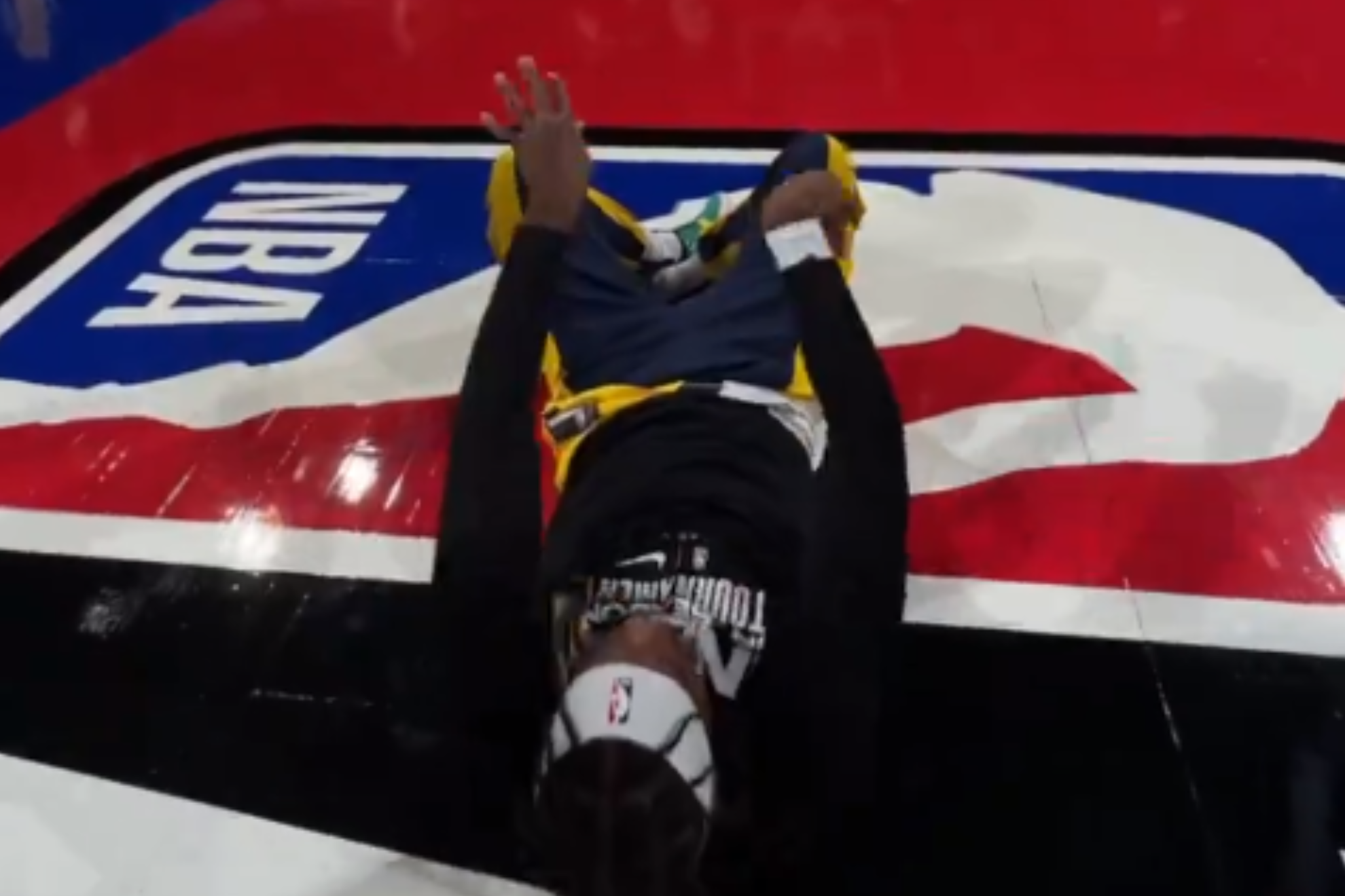 Hield releases the ball for his trick shot.