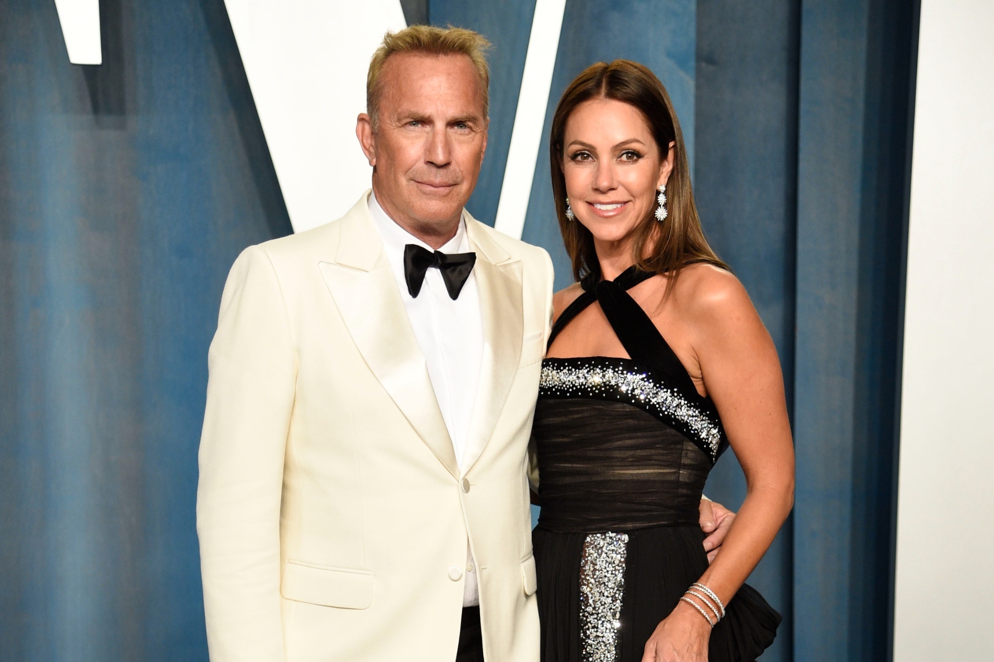 Hollywood star Kevin Costner with his now ex-wife, Christine Baumgartner, in March 2022.