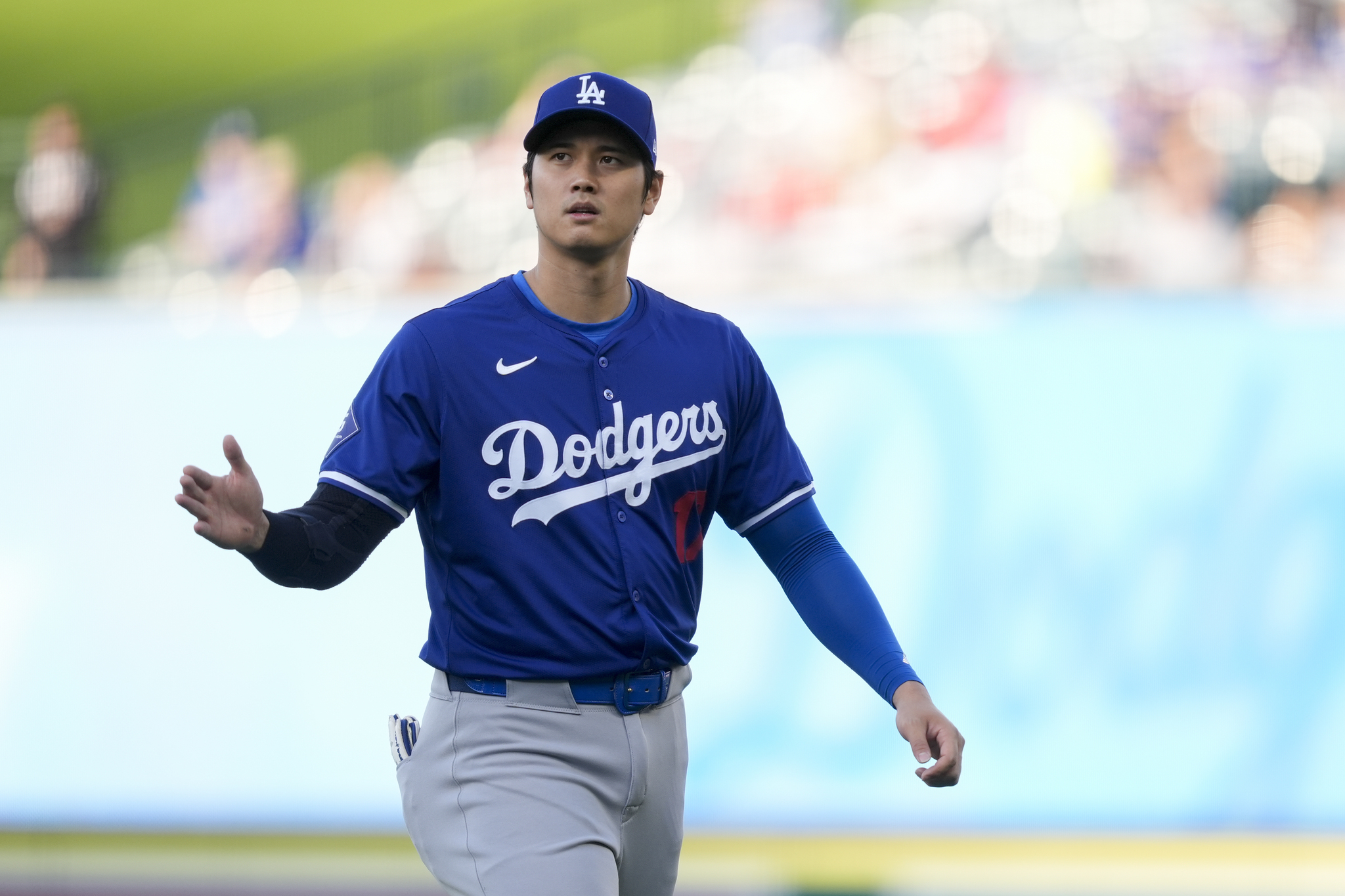 Los Angeles Dodgers designated hitter Shohei Ohtani warms up