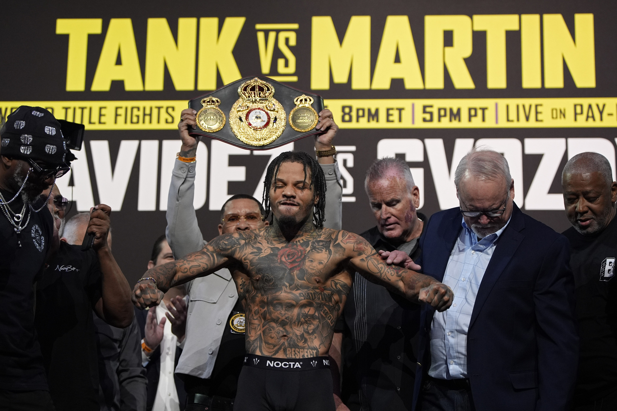 lt;HIT gt;Gervonta lt;/HIT gt;  lt;HIT gt;Davis lt;/HIT gt; poses on the scale during a weigh-in Friday, June 14, 2024, in Las Vegas.  lt;HIT gt;Davis lt;/HIT gt; is scheduled to fight Frank Martin in a WBA lightweight championship fight Saturday in Las Vegas. (AP Photo/John Locher)