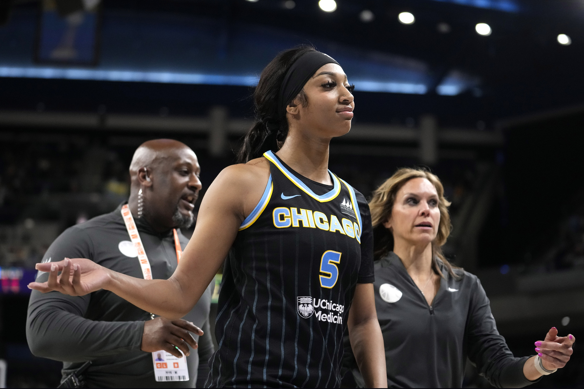 Angel Reese heads to the locker room after being ejected from a WNBA basketball game
