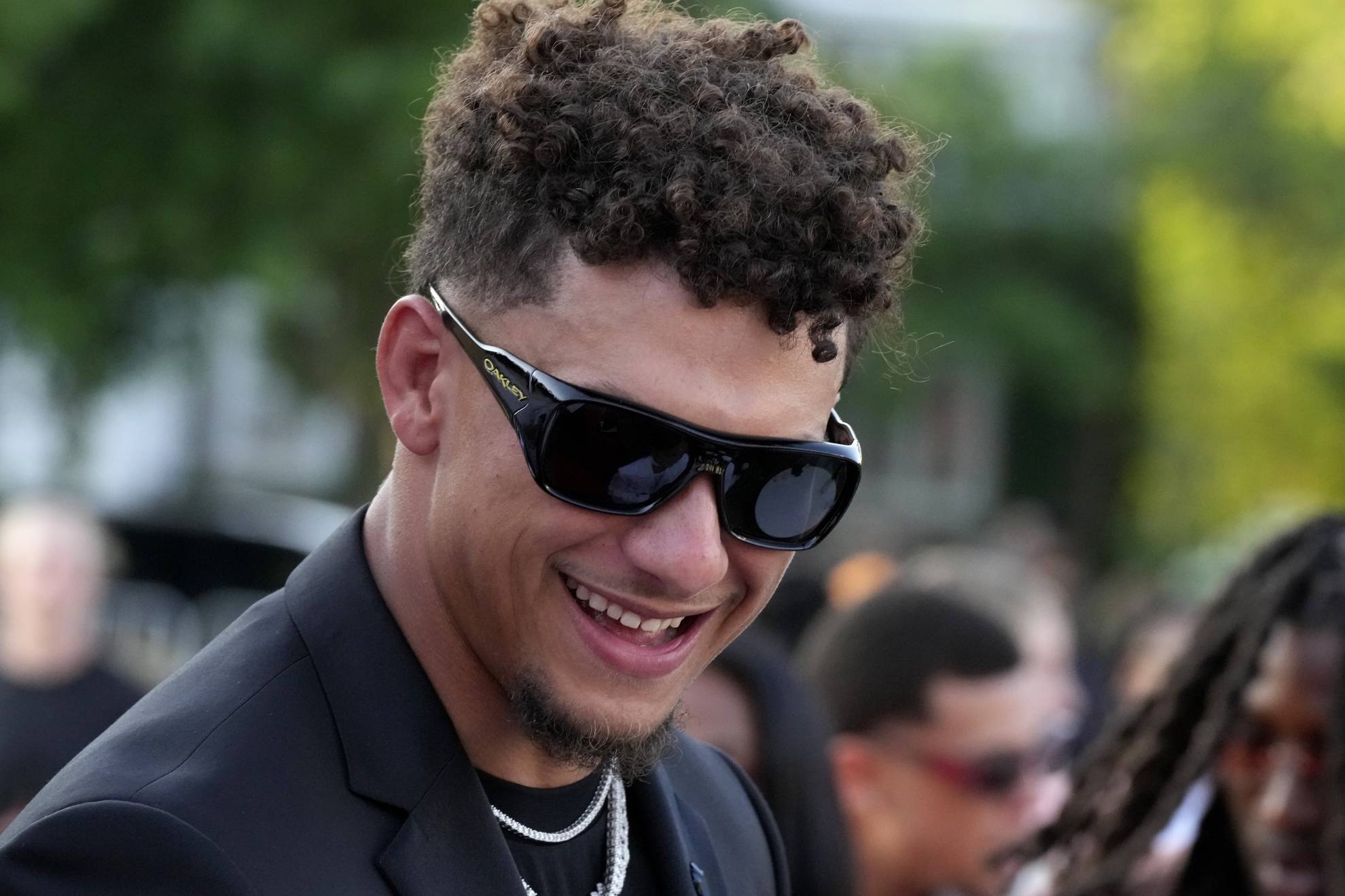 Kansas City Chiefs quarterback Patrick Mahomes arrives on the red carpet before a ceremony for team members to receive their championship rings for winning NFLs Super Bowl 58 football game.