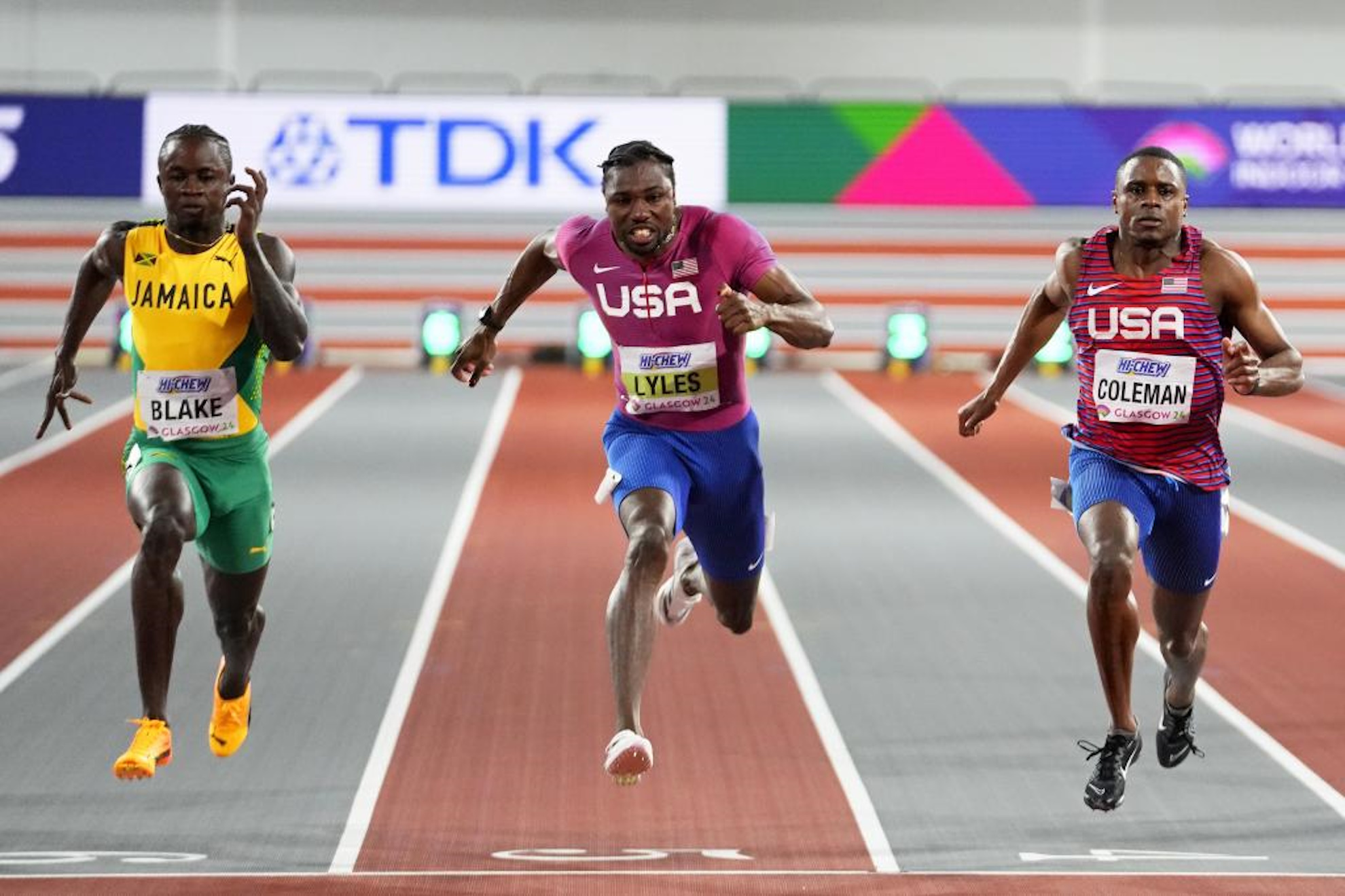 Gold medalist Christian Coleman, of the United States, Silver medalist Noah Lyles, of the United States, and bronze medalist Ackeem Blake.