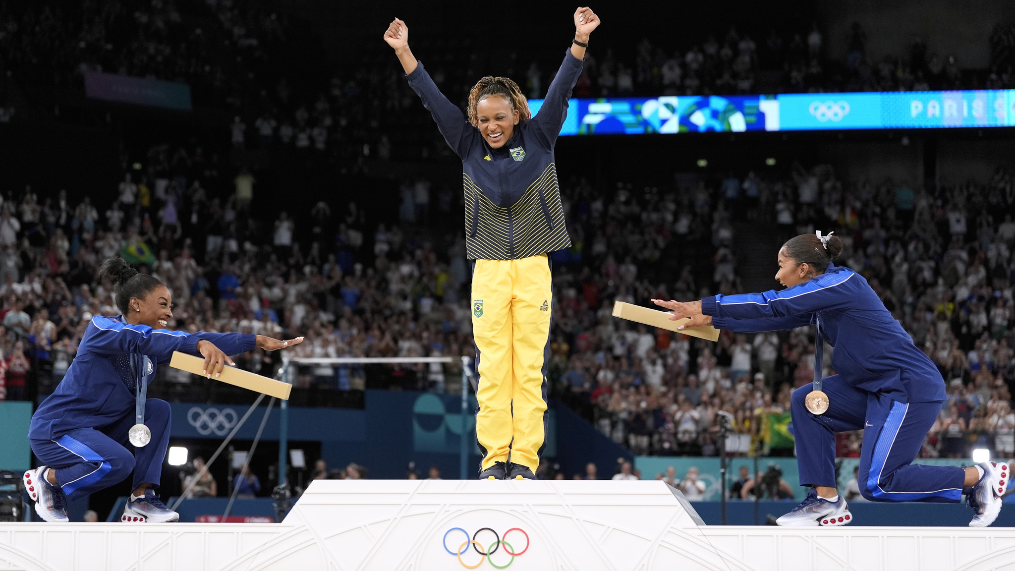 Simone Biles and Jordan Chiles bow to gold medalist Rebeca Andrade