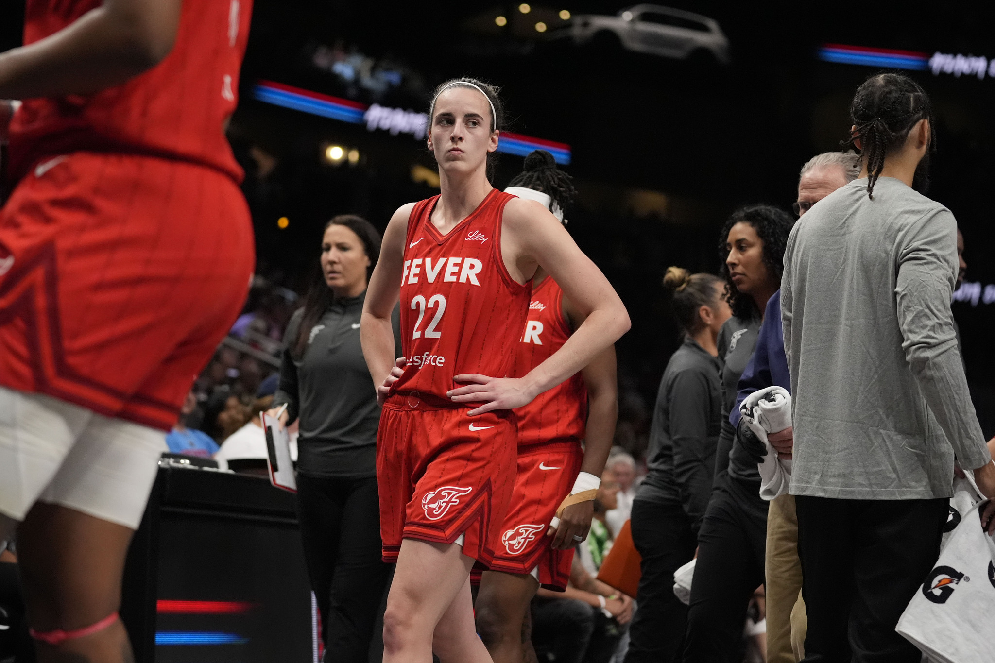 Indiana Fevers Caitlin Clark (22) walks off the court after an injury in a WNBA basketball game