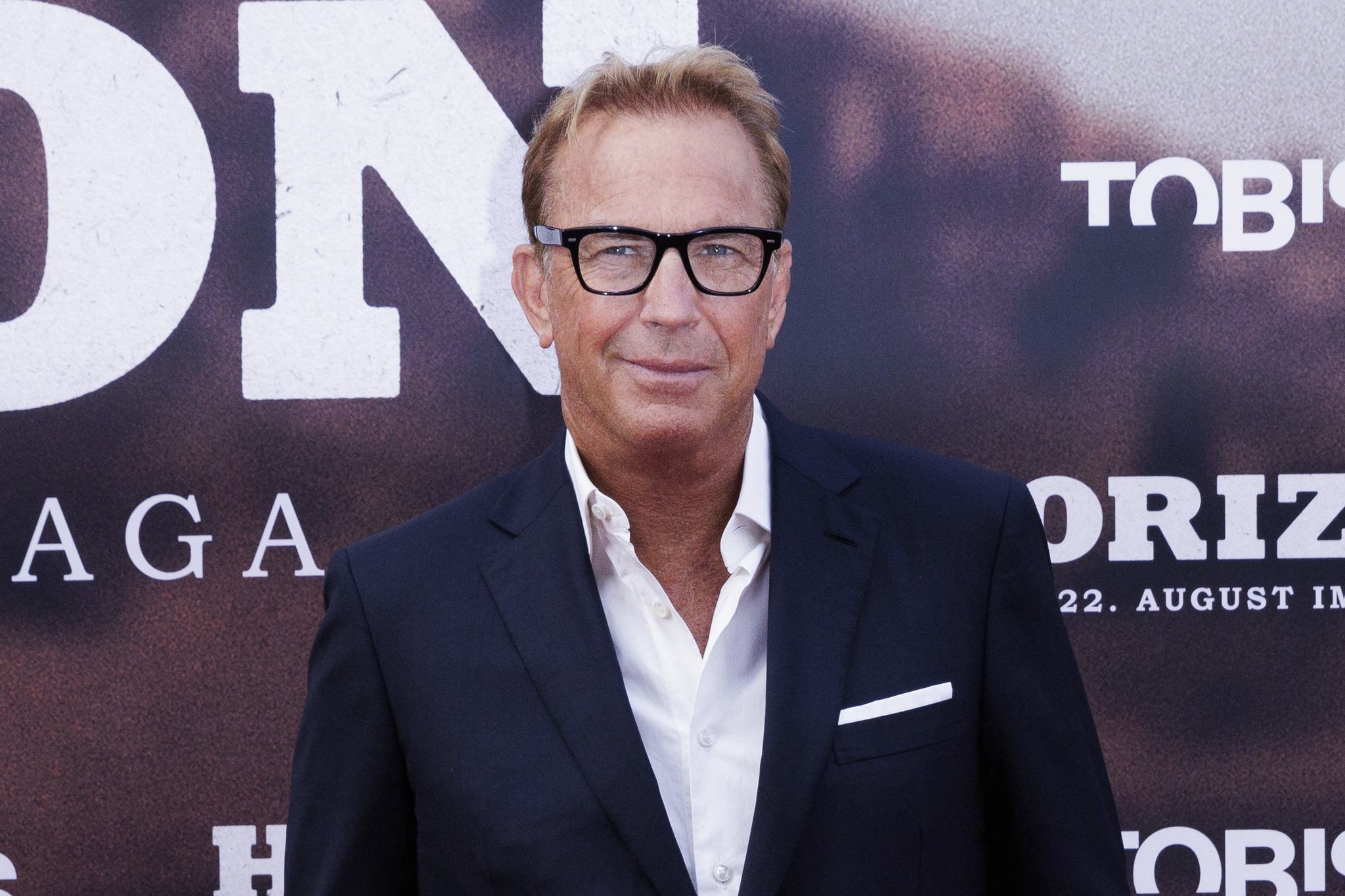 Kevin Costner poses at the German premiere of his film Horizon at the UCI Kinowelt Zoo Palast in Berlin