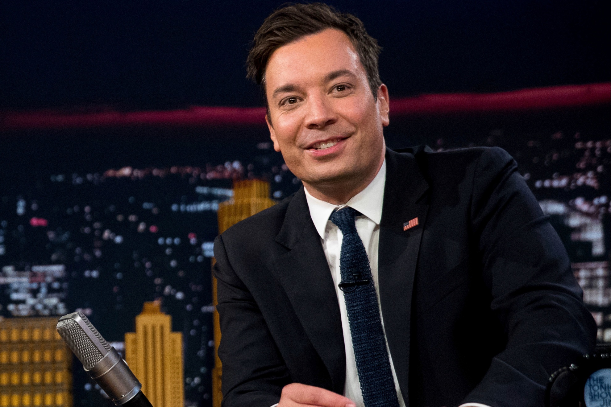 FILE - In this Friday, Sept. 16, 2016, file photo, Jimmy Fallon talks during a taping of The Tonight Show with Jimmy Fallon, in New York. U.S. President Donald Trump is telling Fallon to be a man and stop whimpering about the personal anguish he felt over the backlash he received after messing up Trumps hair during a 2016 campaign appearance on Fallons late-night talk show. (AP Photo/Andrew Harnik, File)