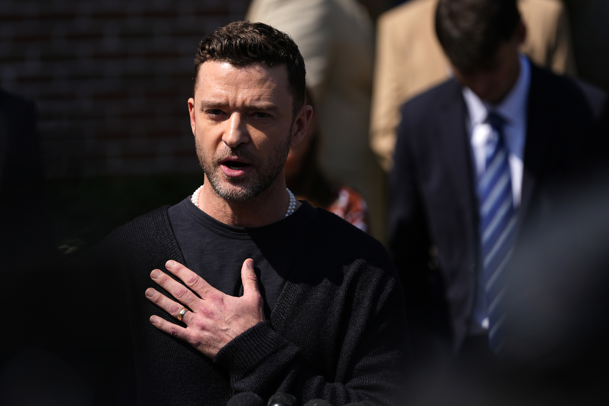 Justin Timberlake speaks to the press after a court hearing