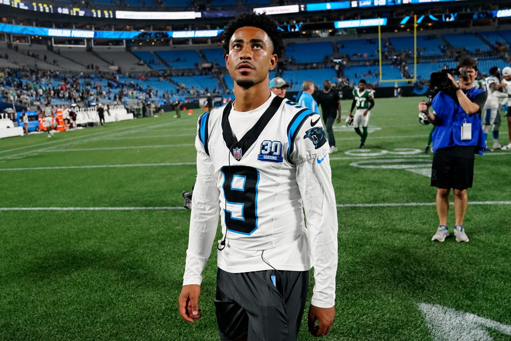Carolina Panthers quarterback Bryce Young (9) walks off the field after a preseason NFL football game against the New York Jets, Saturday, Aug. 17, 2024, in Charlotte, N.C. (AP Photo/Jacob Kupferman)