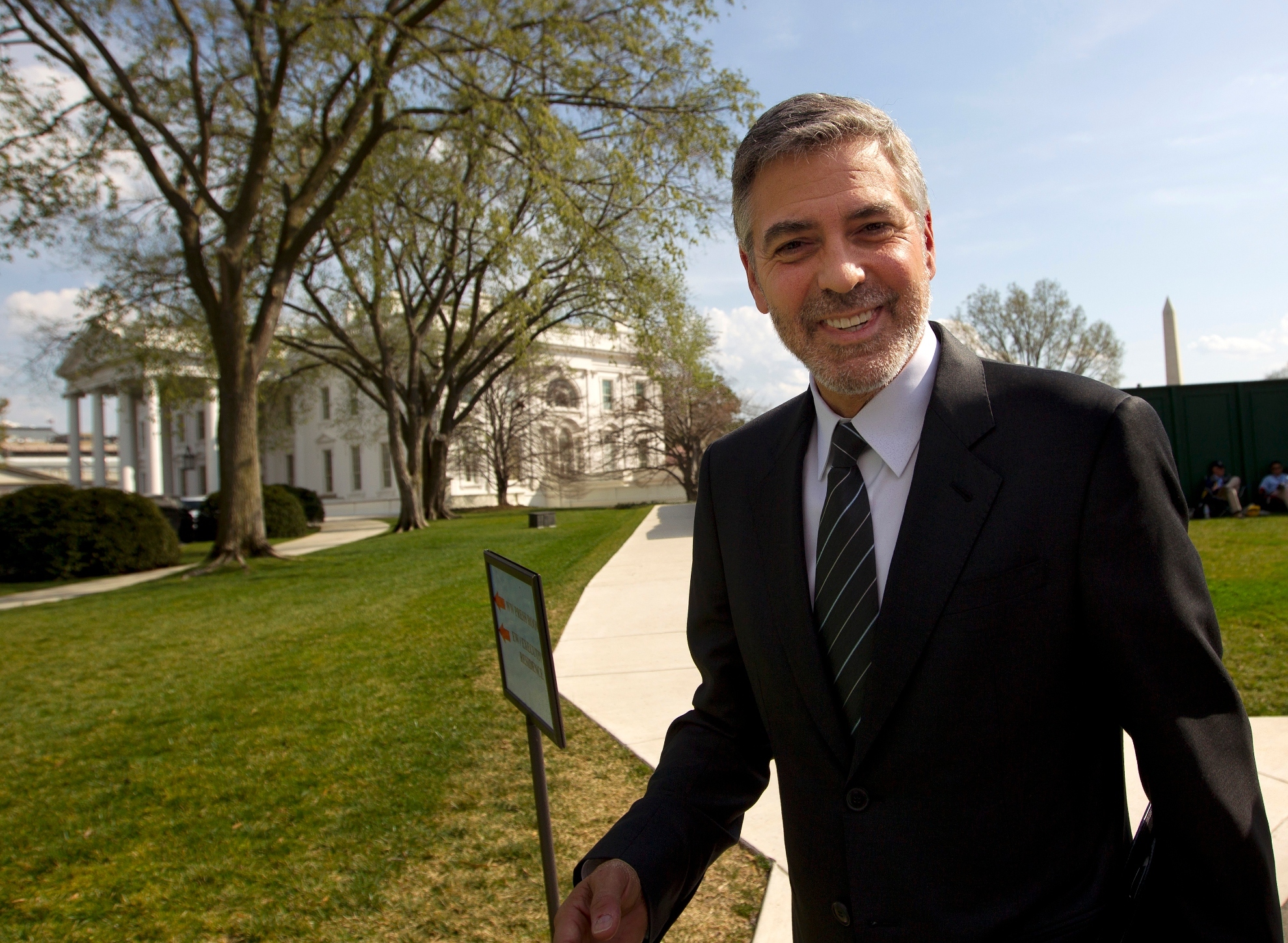 Actor George Clooney leaves the White House in Washington, Thursday, March, 15, 2012, after his meeting with President Barack Obama.