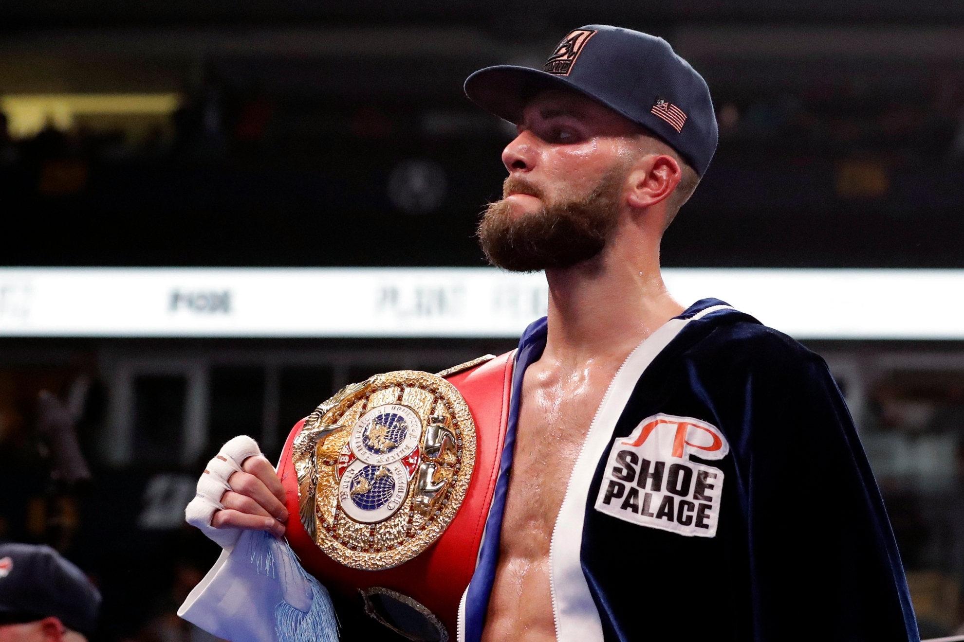 Caleb Plant holds his title belt after defeating Vincent Feigenbutz, of Germany, in the IBF super middleweight championship boxing match Saturday, Feb. 15, 2020, in Nashville, Tenn.