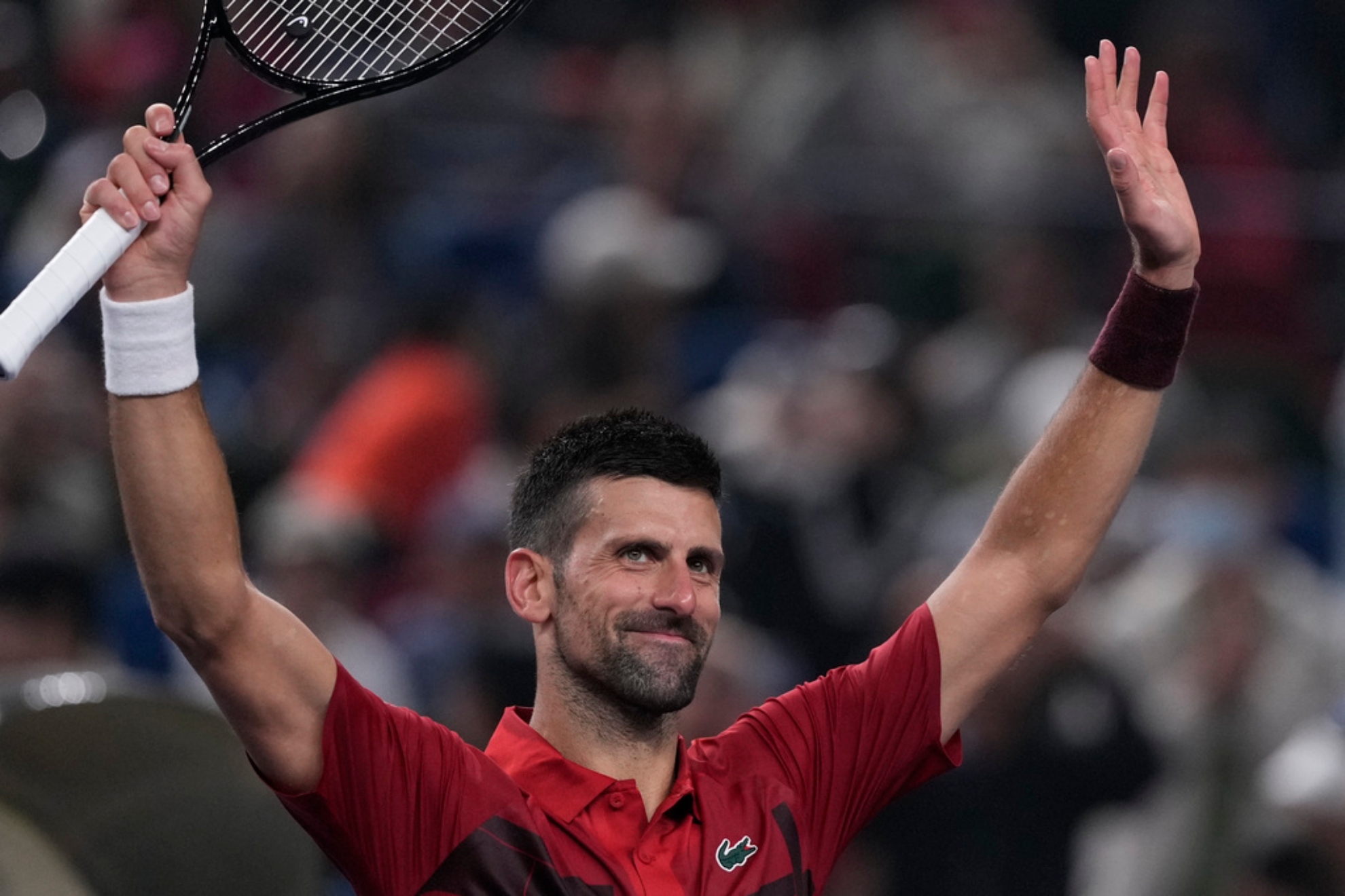 Djokovic greets the crowd after winning in Shanghai