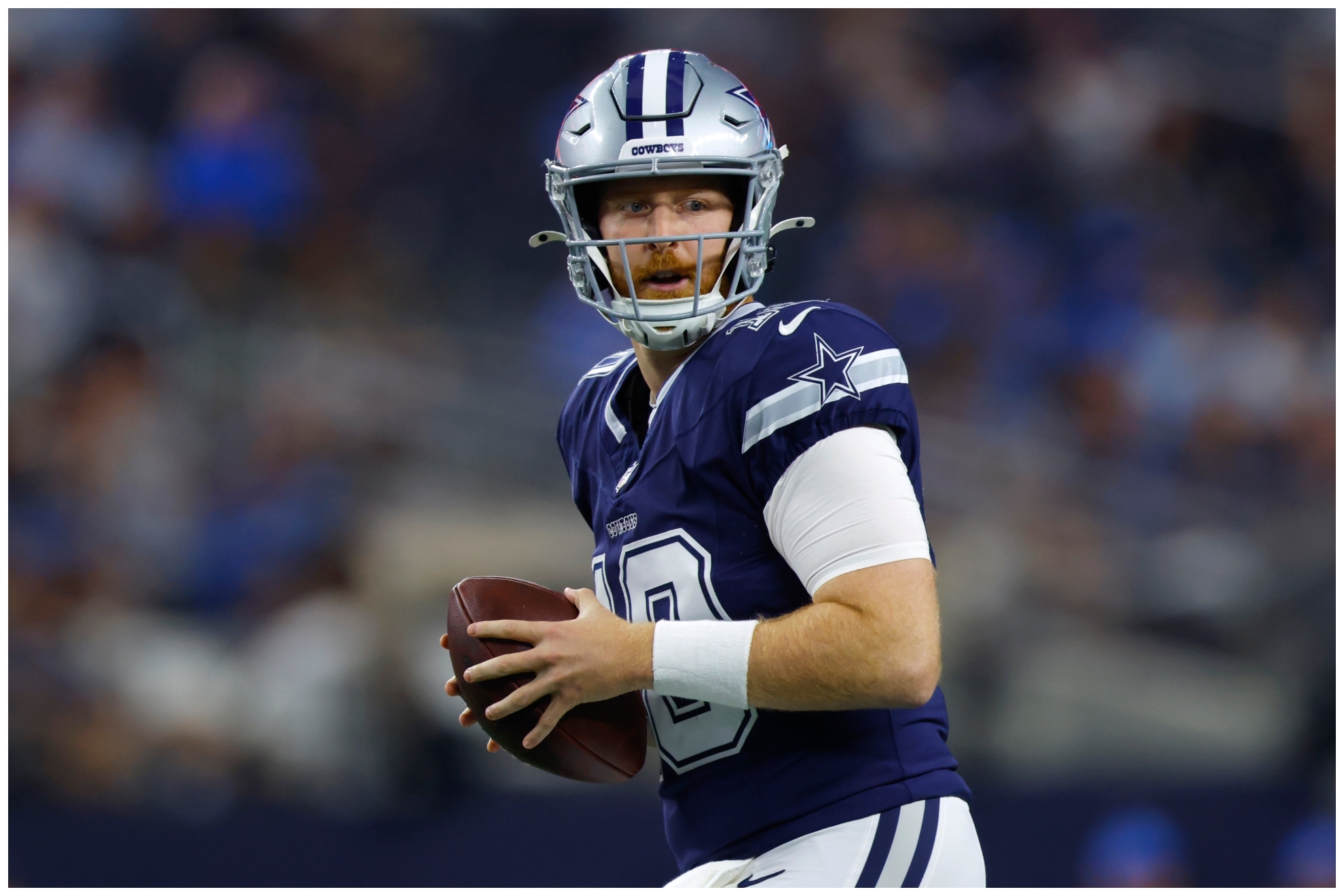 Dallas Cowboys quarterback Cooper Rush drops back to pass against the Detroit Lions in the second half of an NFL football game in Arlington, Texas, Sunday, Oct. 13, 2024