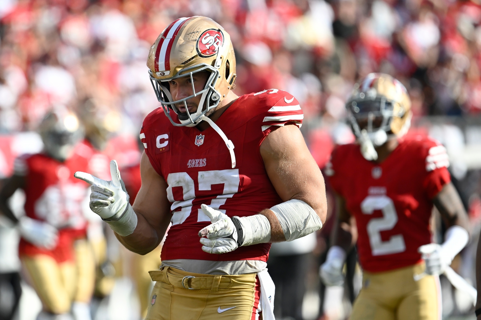 San Francisco 49ers defensive end Nick Bosa (97) celebrates after sacking Tampa Bay Buccaneers quarterback Baker Mayfield during the second half of an NFL football game in Tampa, Fla., Sunday, Nov. 10, 2024.