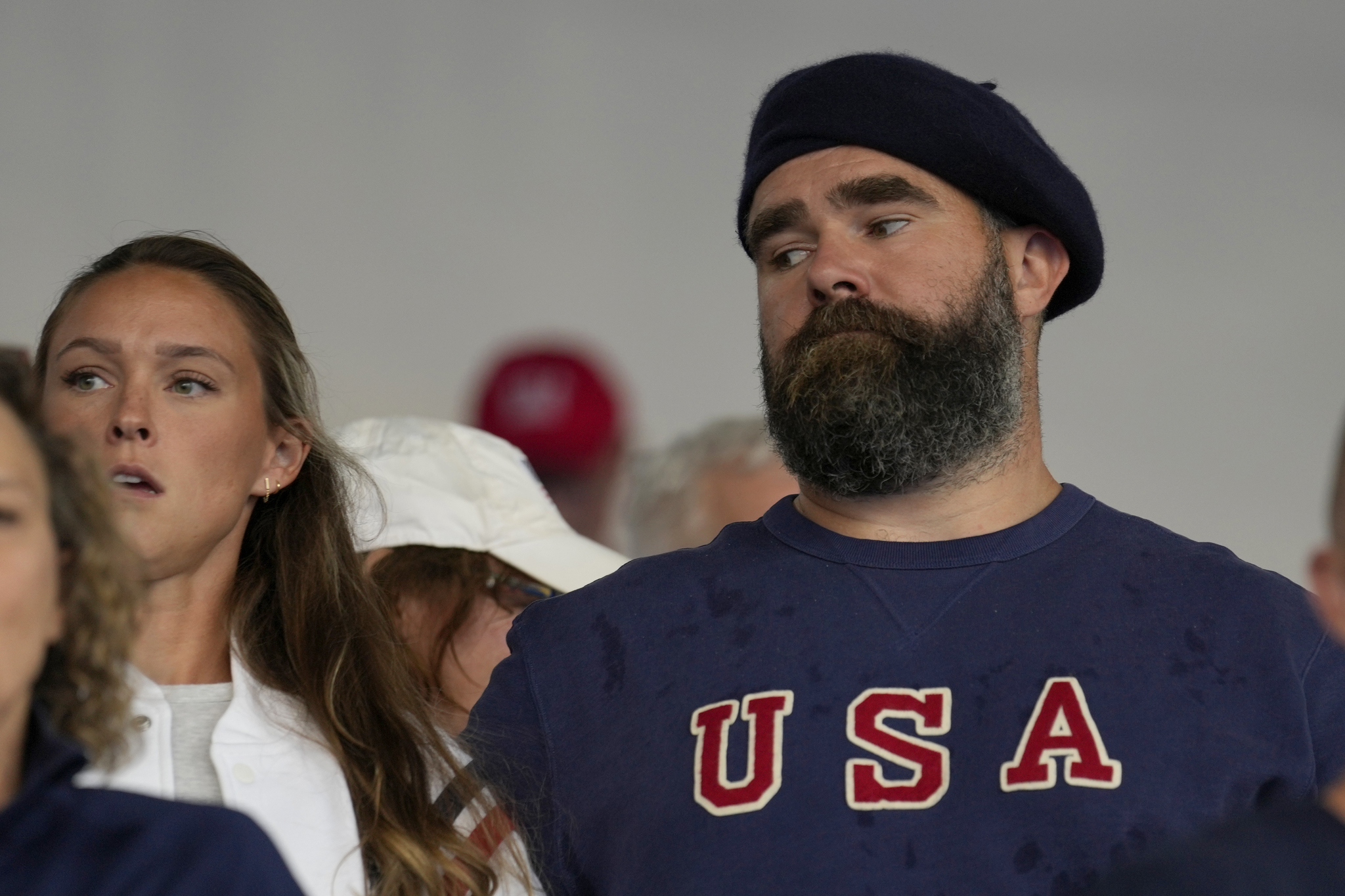 Recently retired Philadelphia Eagles lineman Jason Kelce and wife Kylie watch the womens field hockey match between the Argentina and United States, at the Yves-du-Manoir Stadium