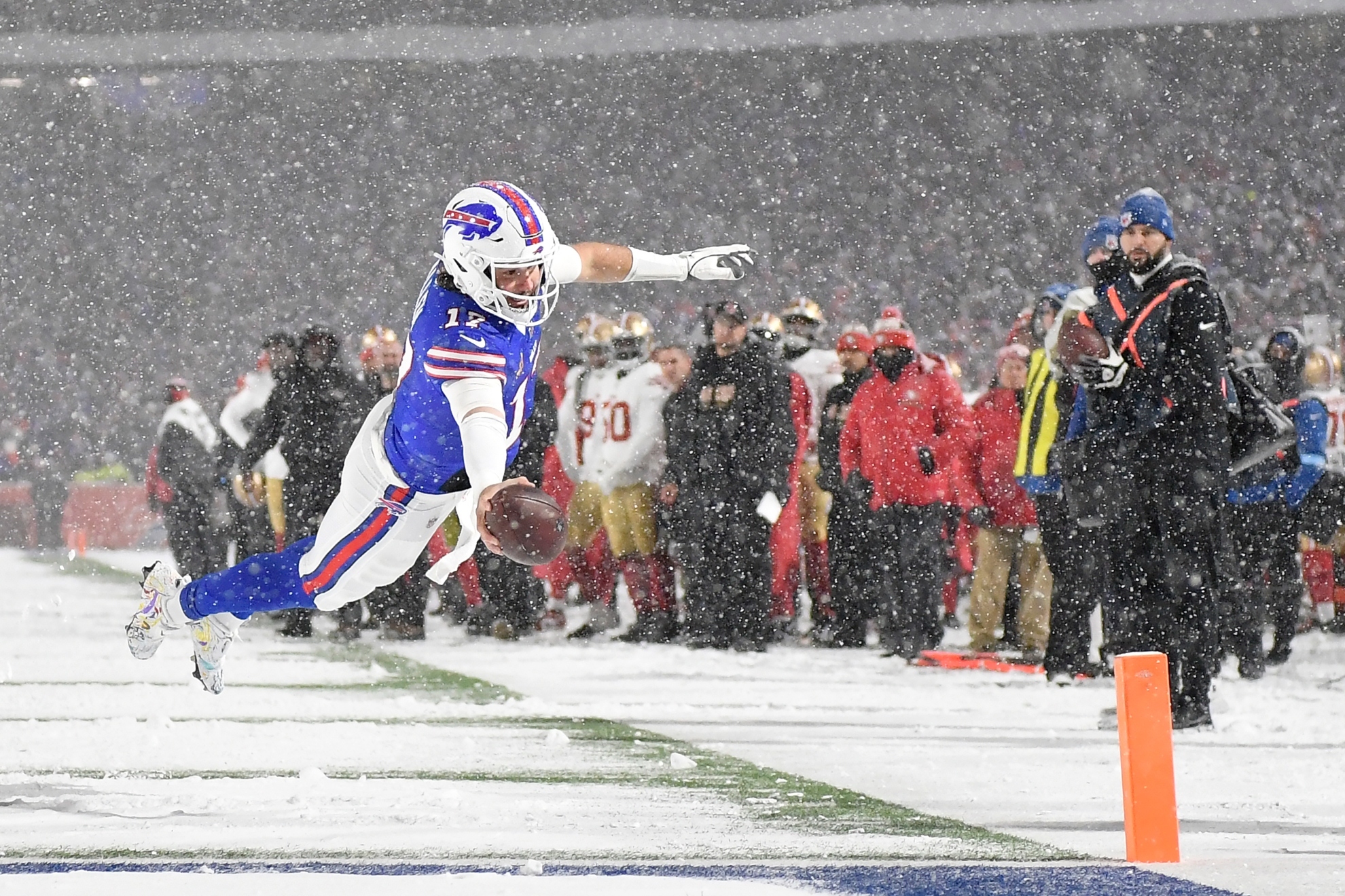 The Bills star becomes the first QB to throw, rush, and catch a touchdown in a single game during a 35-10 victory
