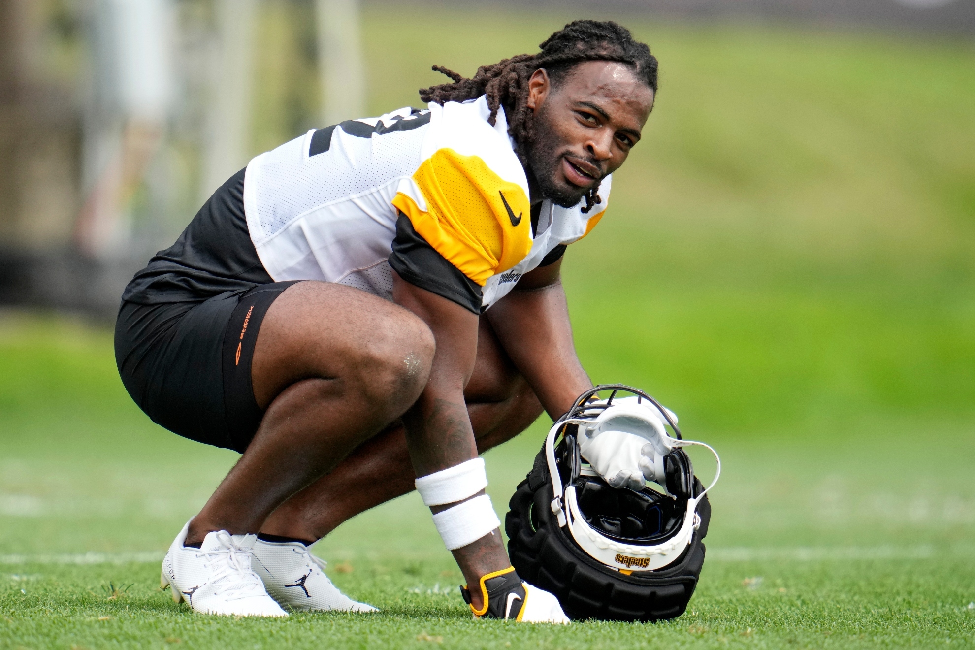 Pittsburgh Steelers running back Najee Harris takes a break during the NFL football teams training camp in Latrobe, Pa., Thursday, July 25, 2024.