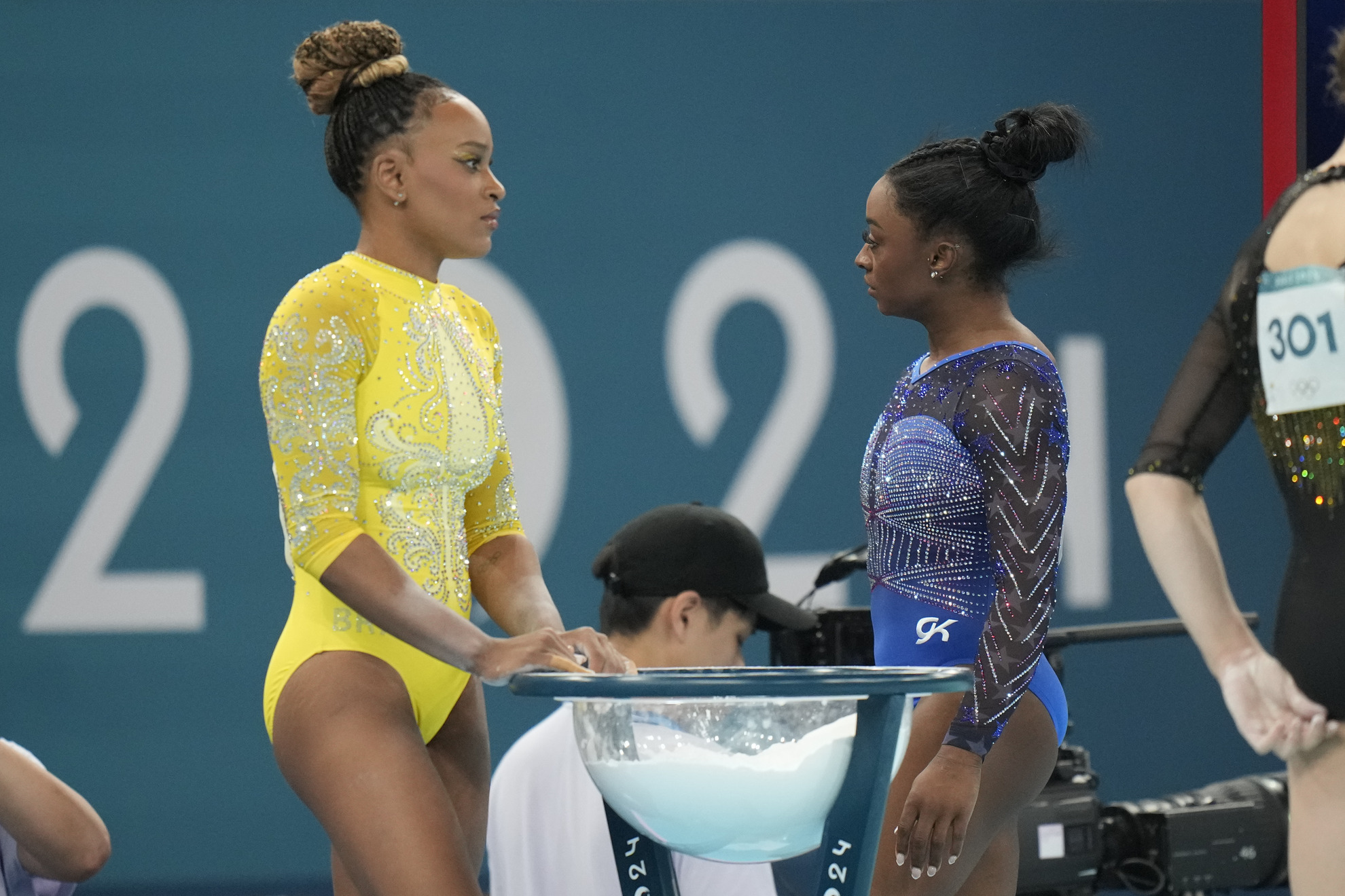 Rebeca Andrade, left, of Brazil, and Simone Biles, of the United States