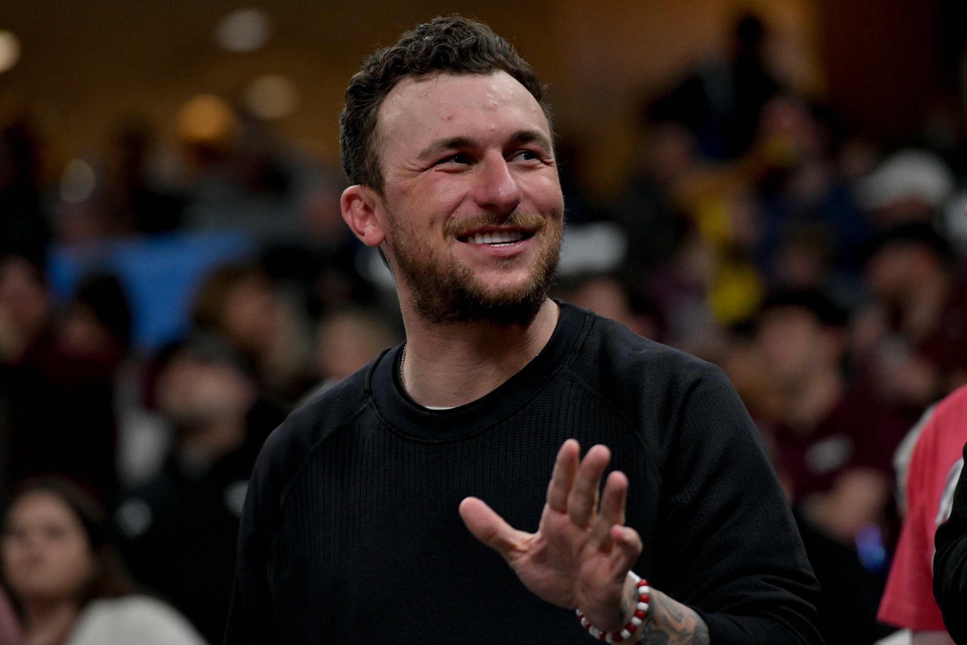 Johnny Manziel attends a first-round college basketball game between Texas A&M and Nebraska in the NCAA Tournament, Friday, March 22, 2024, in Memphis, Tenn.
