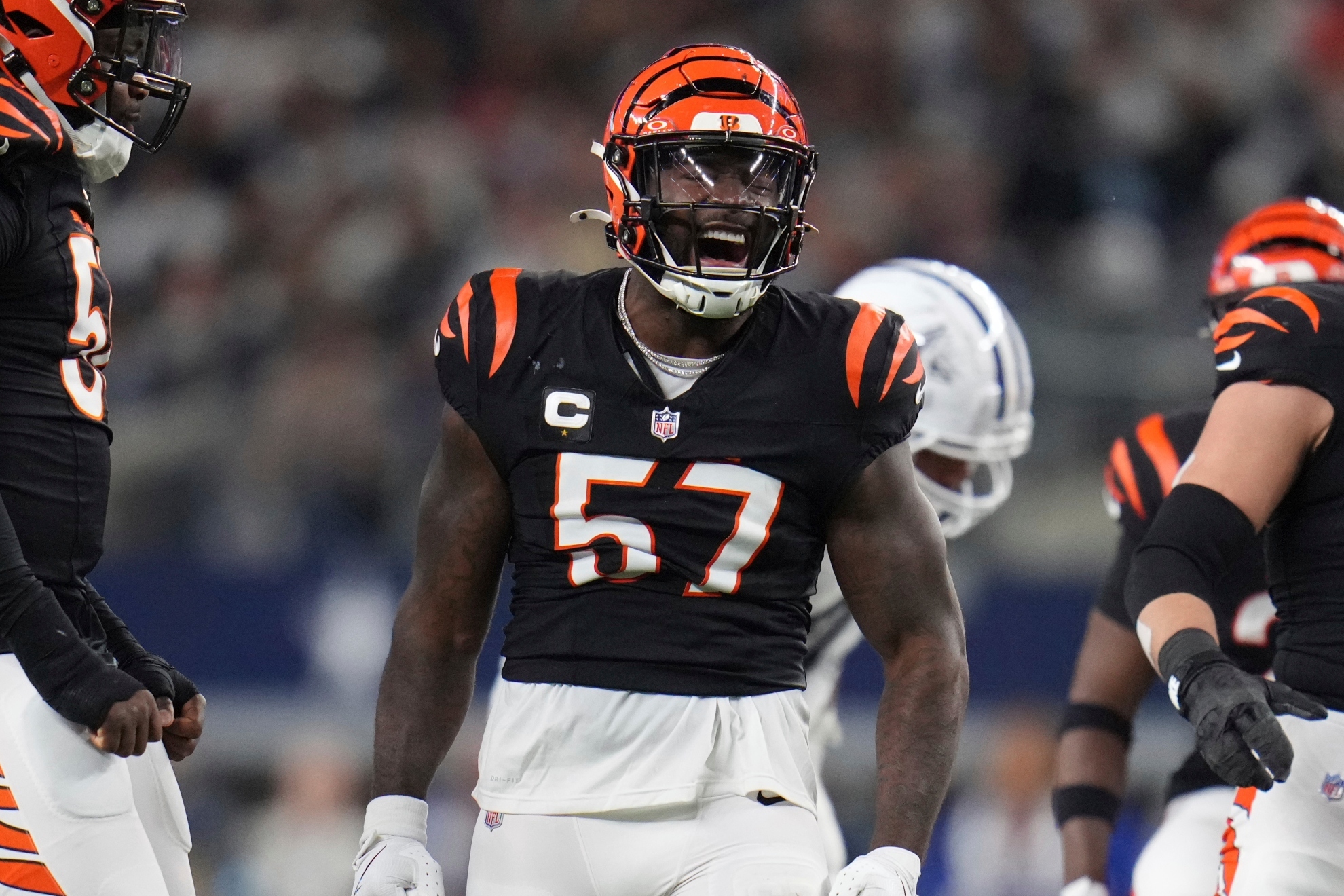 The Bengals linebackers exaggerated fall knocks off a refs hat, drawing memes and a critical penalty against Dallas