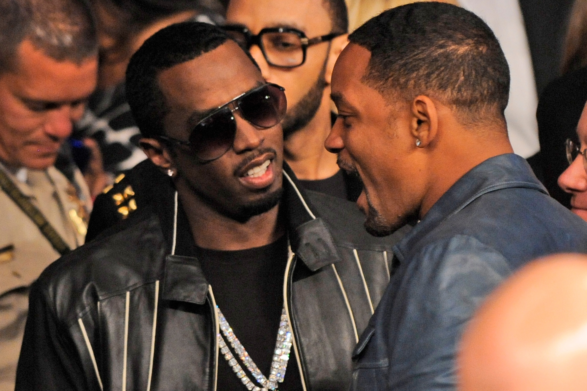 Entertainer Diddy, left, chats with actor Will Smith prior to the WBA welterweight boxing match between Floyd Mayweather Jr., and Shane Mosley, Saturday, May 1, 2010, in Las Vegas.