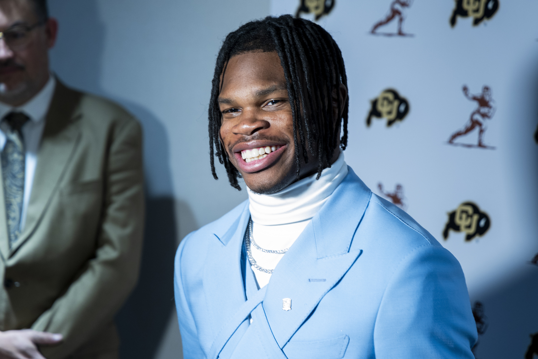 Heisman Trophy finalist  lt;HIT gt;Travis lt;/HIT gt;  lt;HIT gt;Hunter lt;/HIT gt;, of Colorado, speaks speaks at a college football press conference, Saturday, Dec. 14, 2024, in New York. (AP Photo/Corey Sipkin)