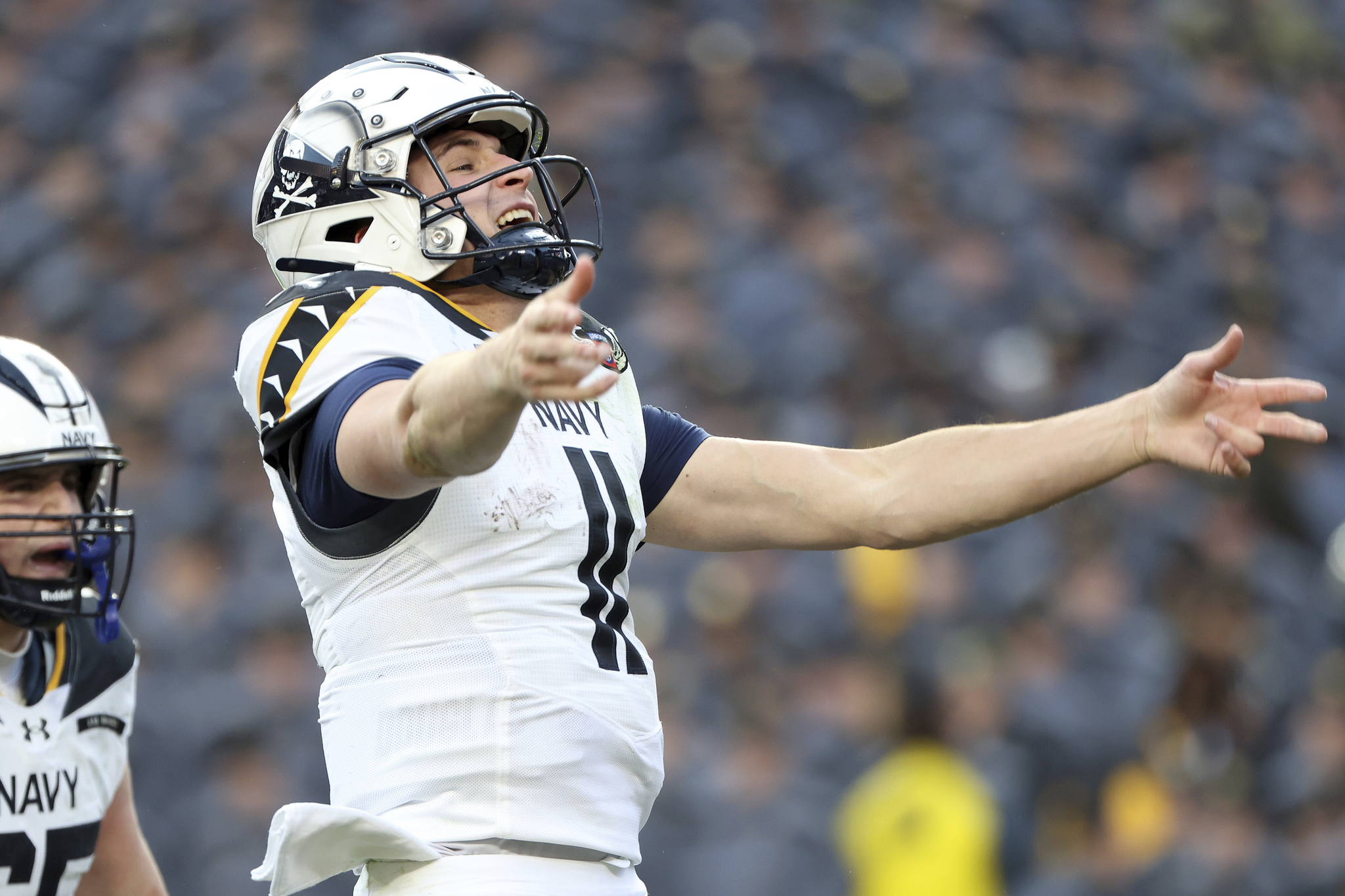  lt;HIT gt;Navy lt;/HIT gt; quarterback Blake Horvath (11) celebrates after scoring a touchdown during the first half of an NCAA college football game against  lt;HIT gt;Army lt;/HIT gt;, Saturday, Dec. 14, 2024, in Landover, Md. (AP Photo/Daniel Kucin Jr.)