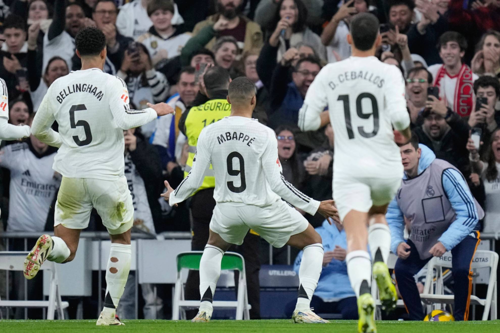 Kylian Mbappe celebrates after scoring the opening goal during the Spanish La Liga soccer match between Real Madrid and Sevilla  /