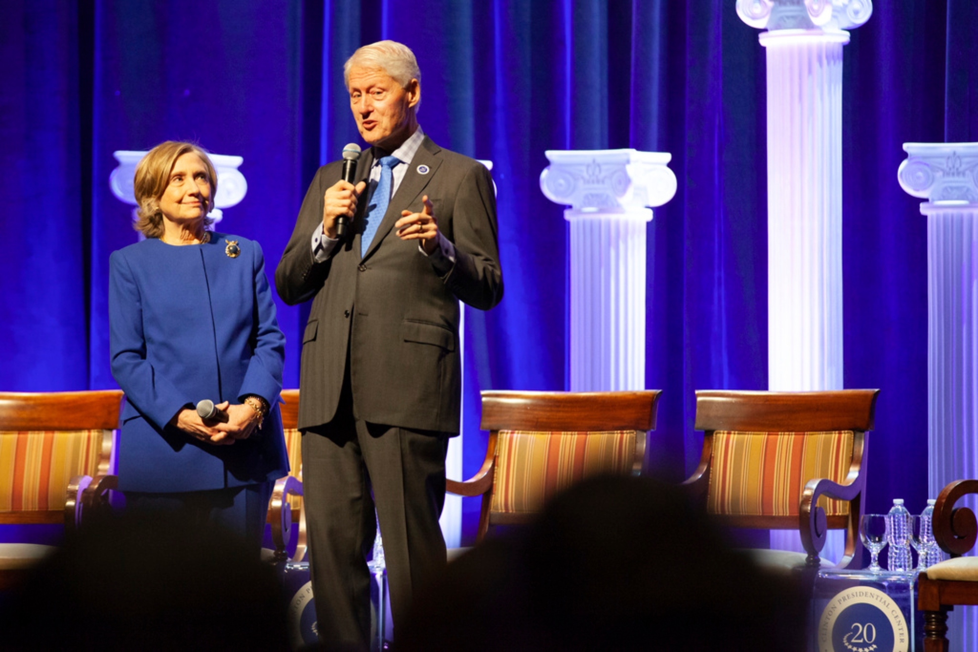 Former President Clinton and former Secretary of State Hillary Rodham Clinton address the audience during the Kumpuris Distinguished Lecture series.