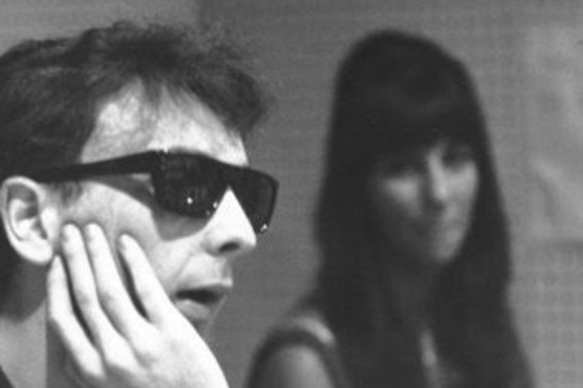 Phil Spector and Cher in a recording studio.