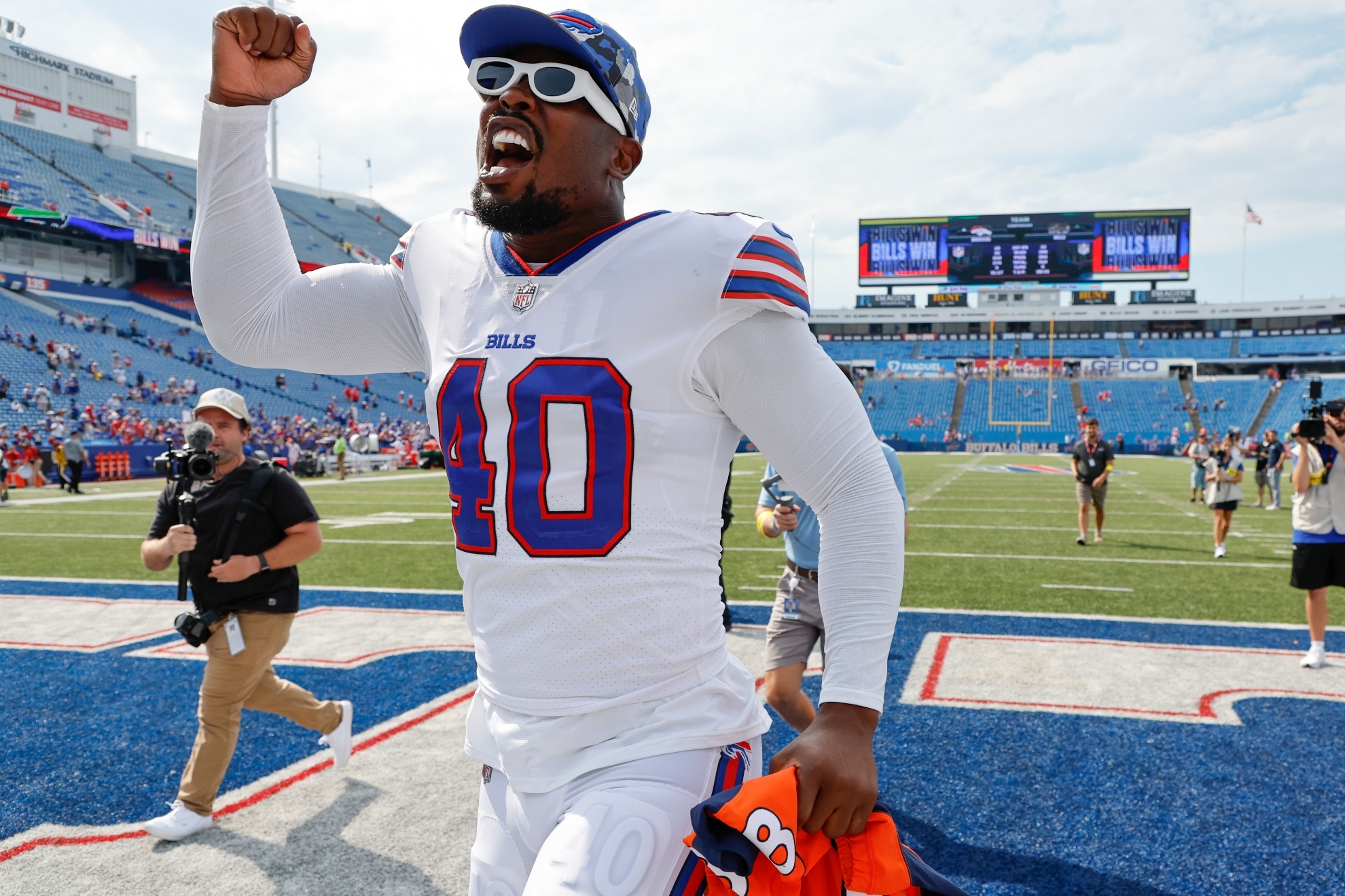 Buffalo Bills Von Miller reacts as he leaves the field after a preseason NFL football game against the Denver Broncos, Saturday, Aug. 20, 2022, in Orchard Park, N.Y.