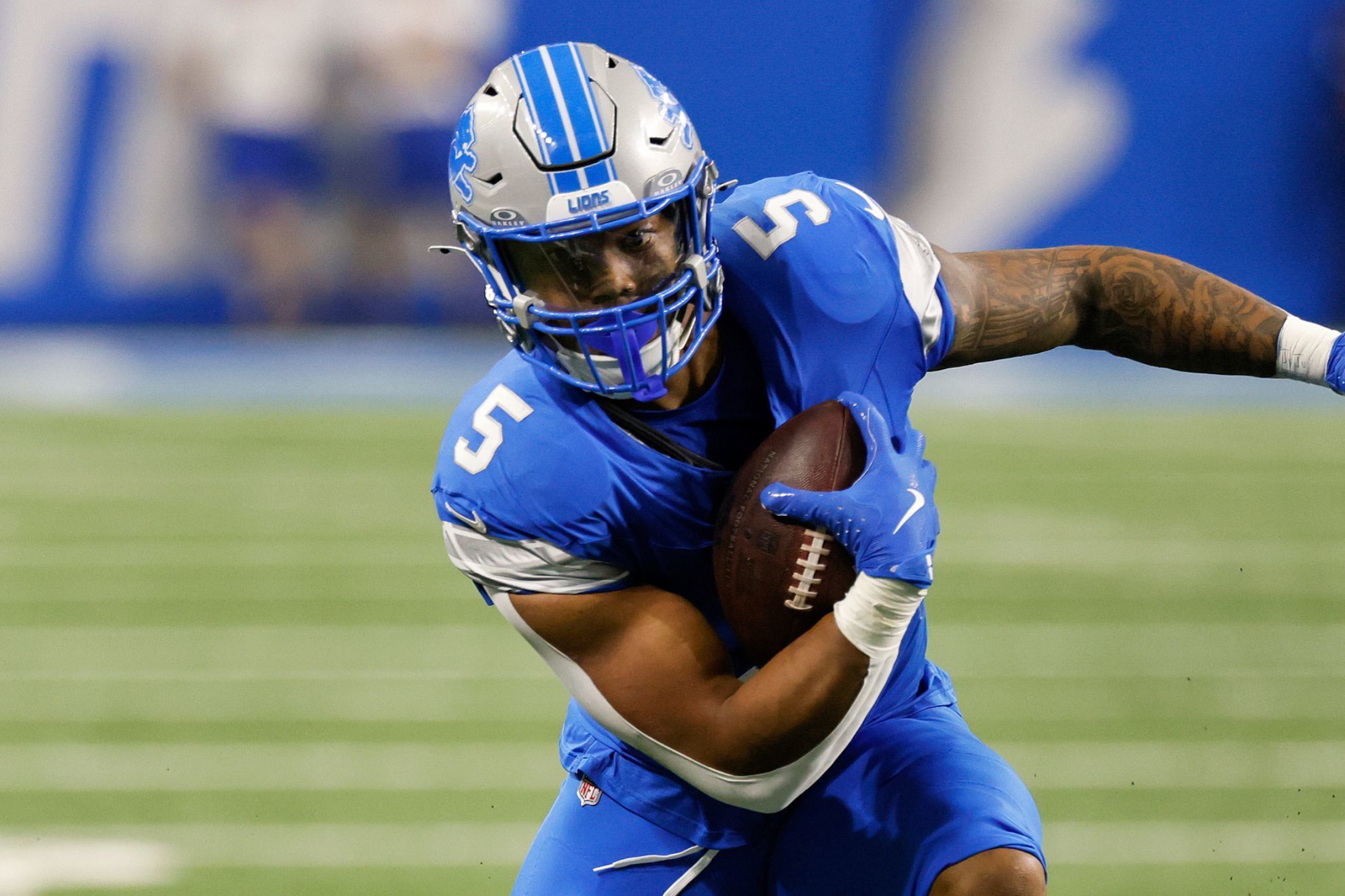 David Montgomery reminds Lions of his quarterback skills in surprise play