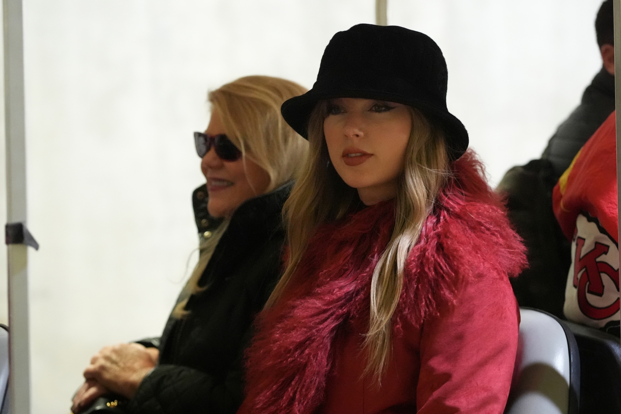 Taylor Swift arrives with her mother Andrea Swift, left, before an NFL football game between the Kansas City Chiefs and the Houston Texans Saturday, Dec. 21, 2024, in Kansas City, Mo.
