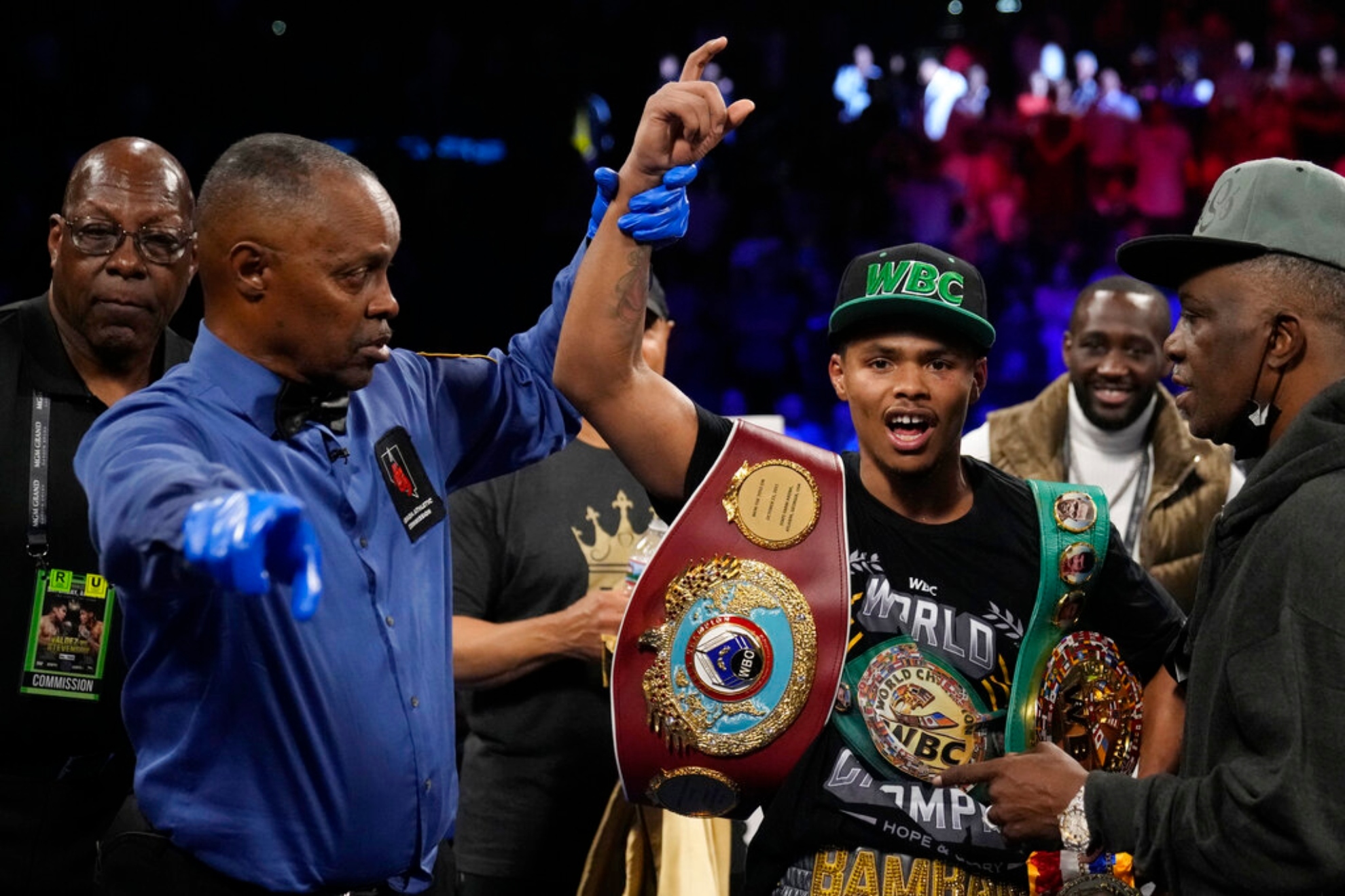 Shakur Stevenson, right, celebrates after defeating Oscar Valdez during a WBC-WBO junior lightweight title boxing bout.