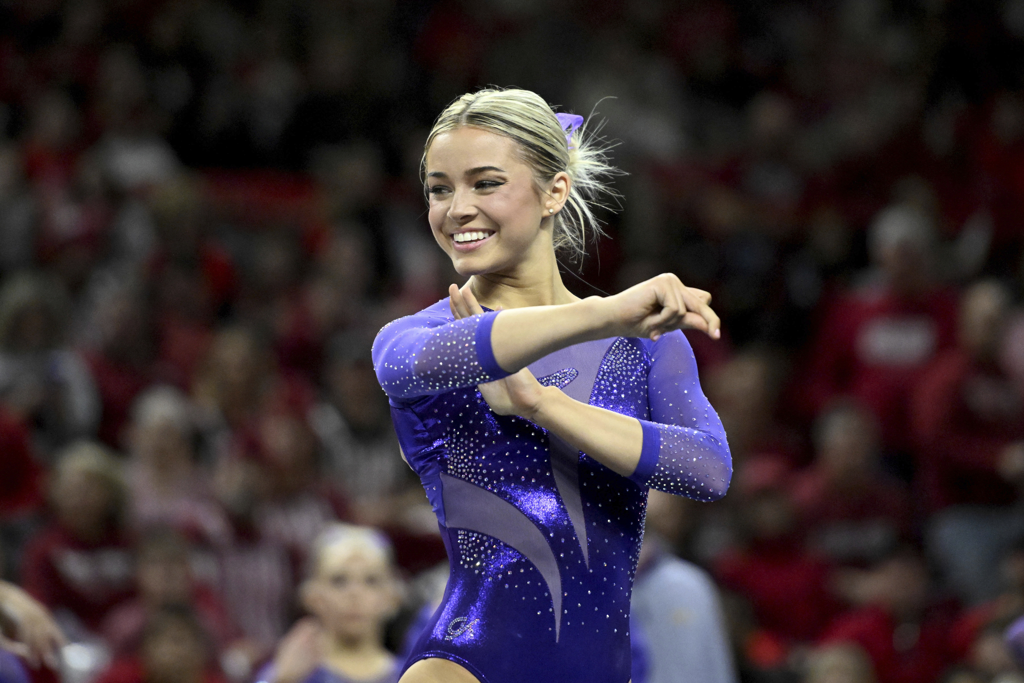 LSU gymnast Olivia Dunne competes on the floor against Arkansas during an NCAA gymnastics meet